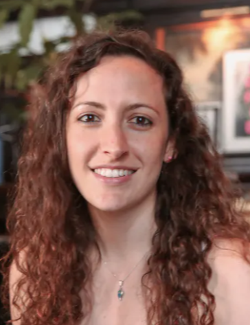 a person smiling for the camera