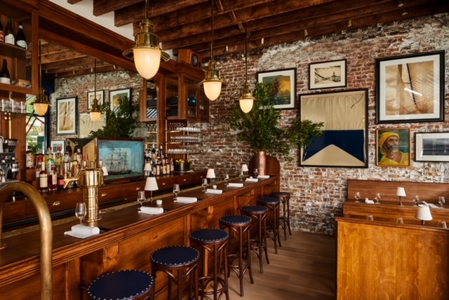a room filled with furniture and a table in a restaurant
