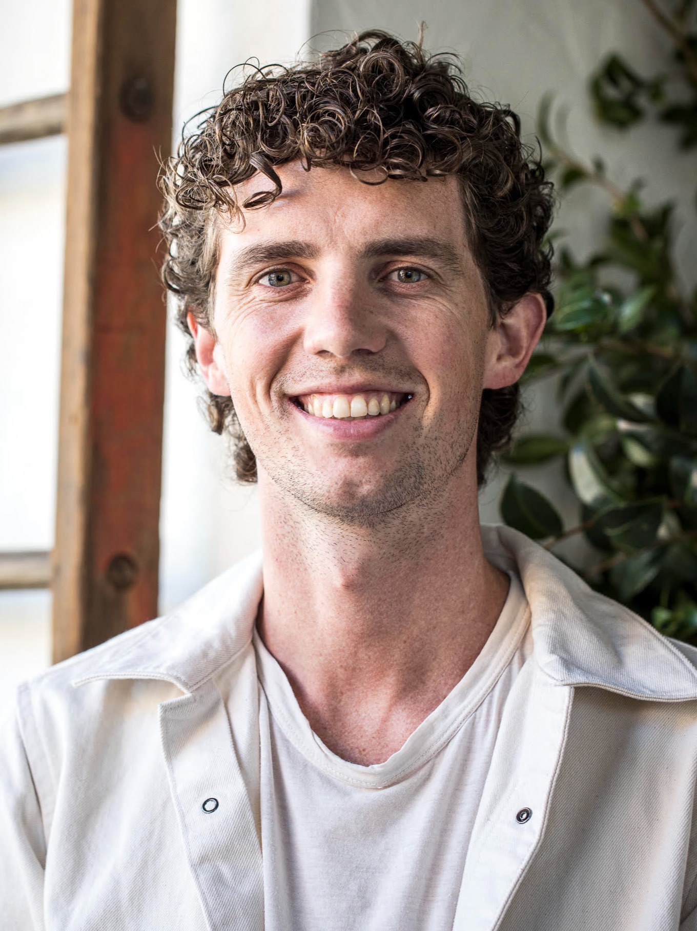 a man smiling for the camera