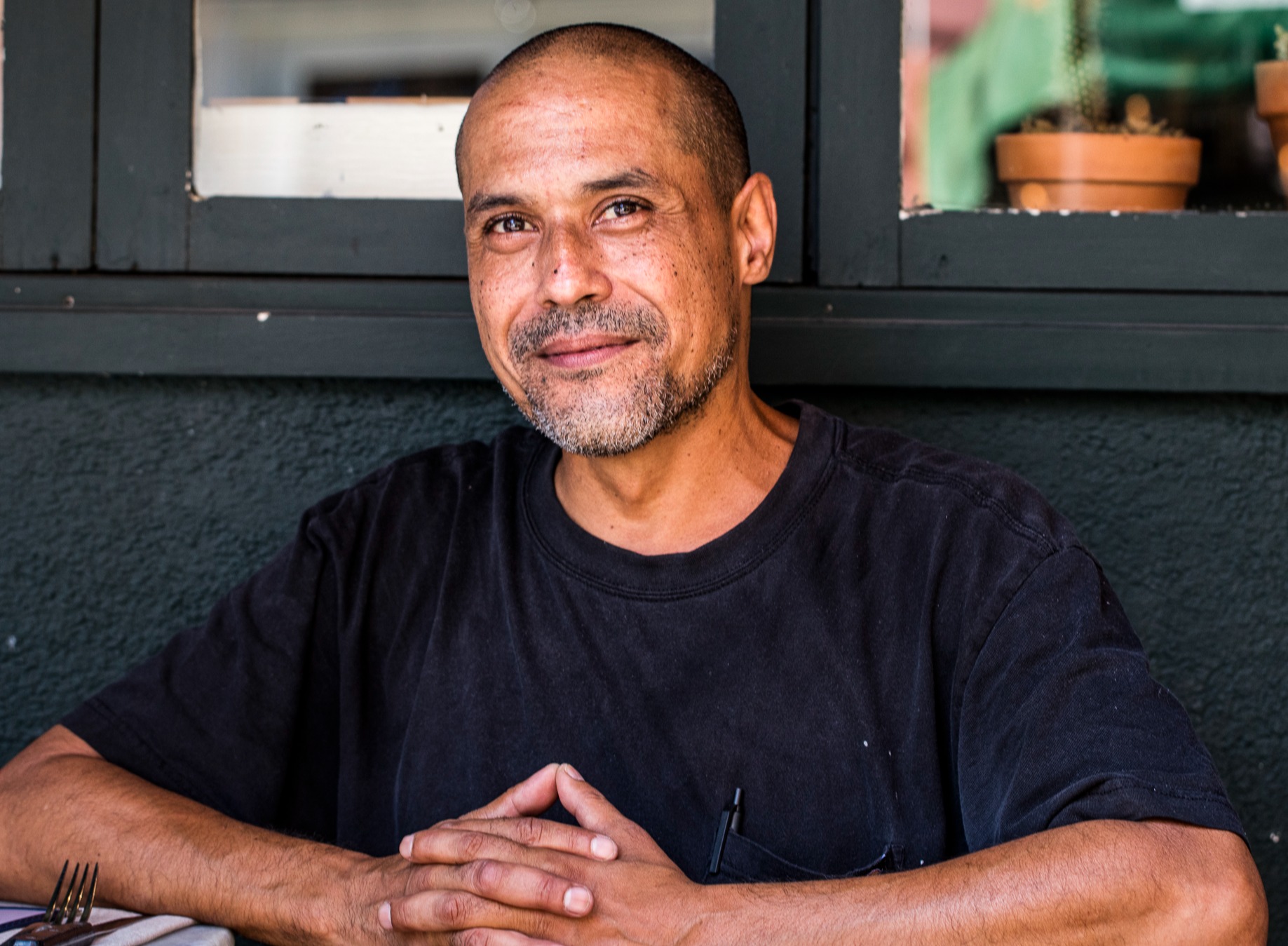 a man sitting on a table
