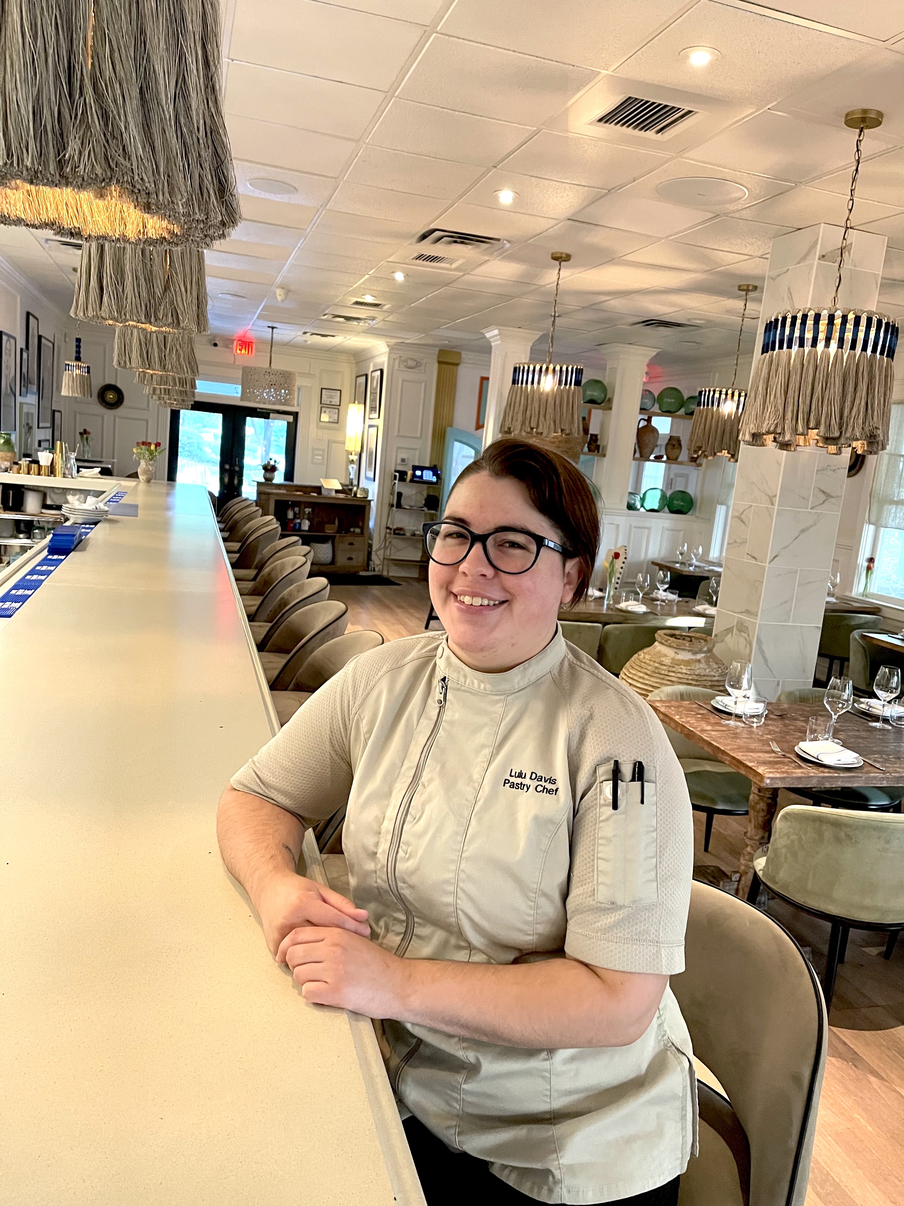 a man and a woman sitting on a table