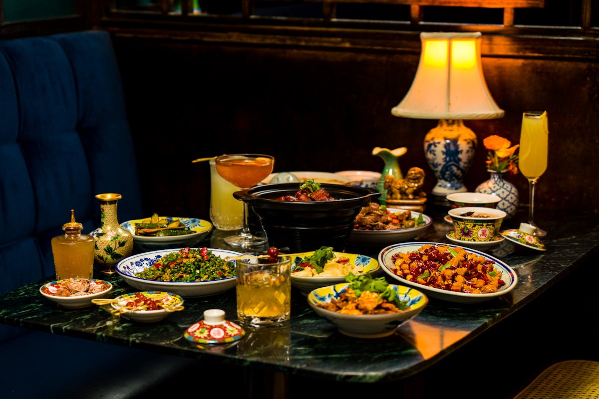 a table topped with plates of food