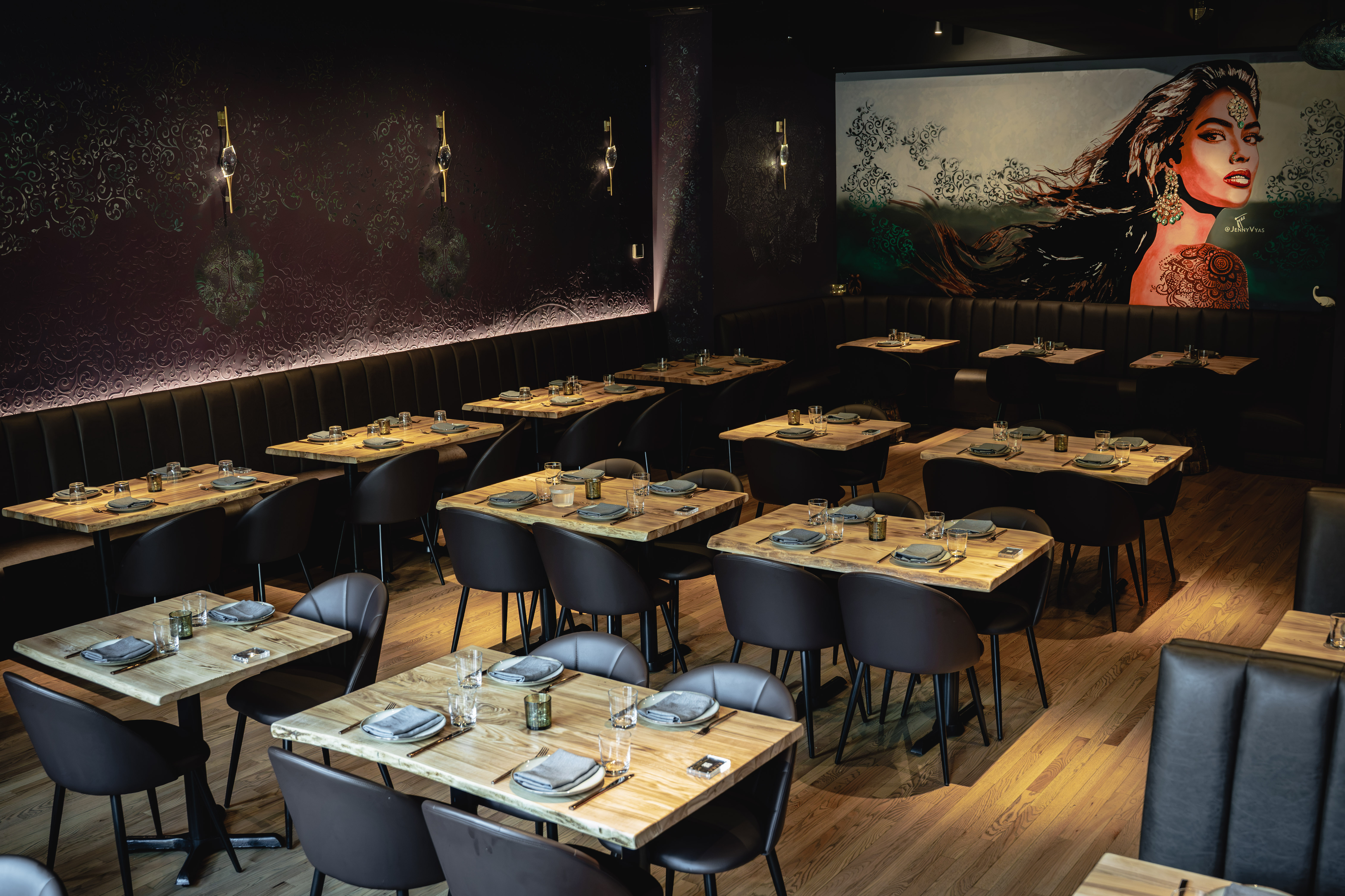 a restaurant with tables and chairs