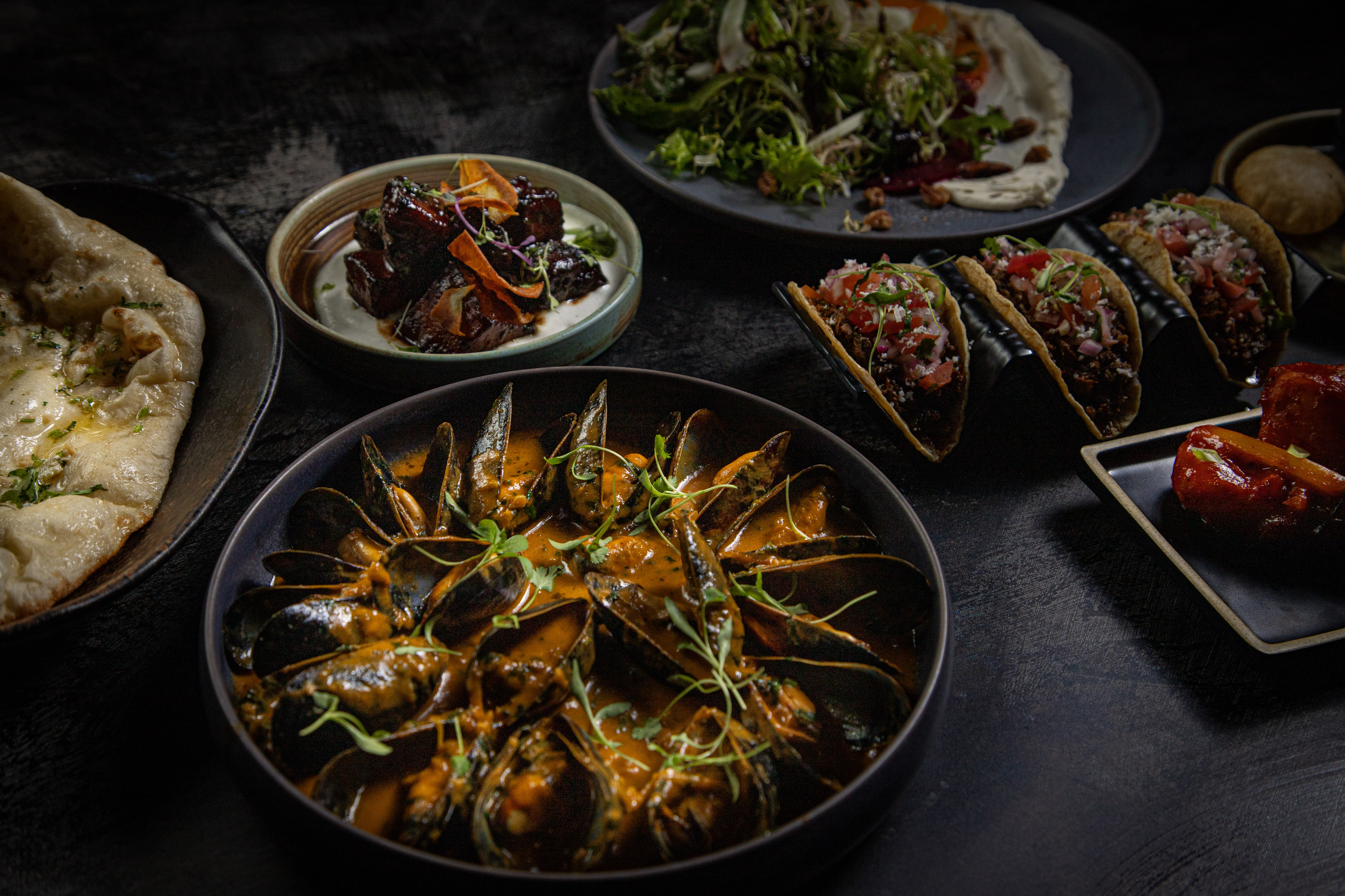a group of plates of food