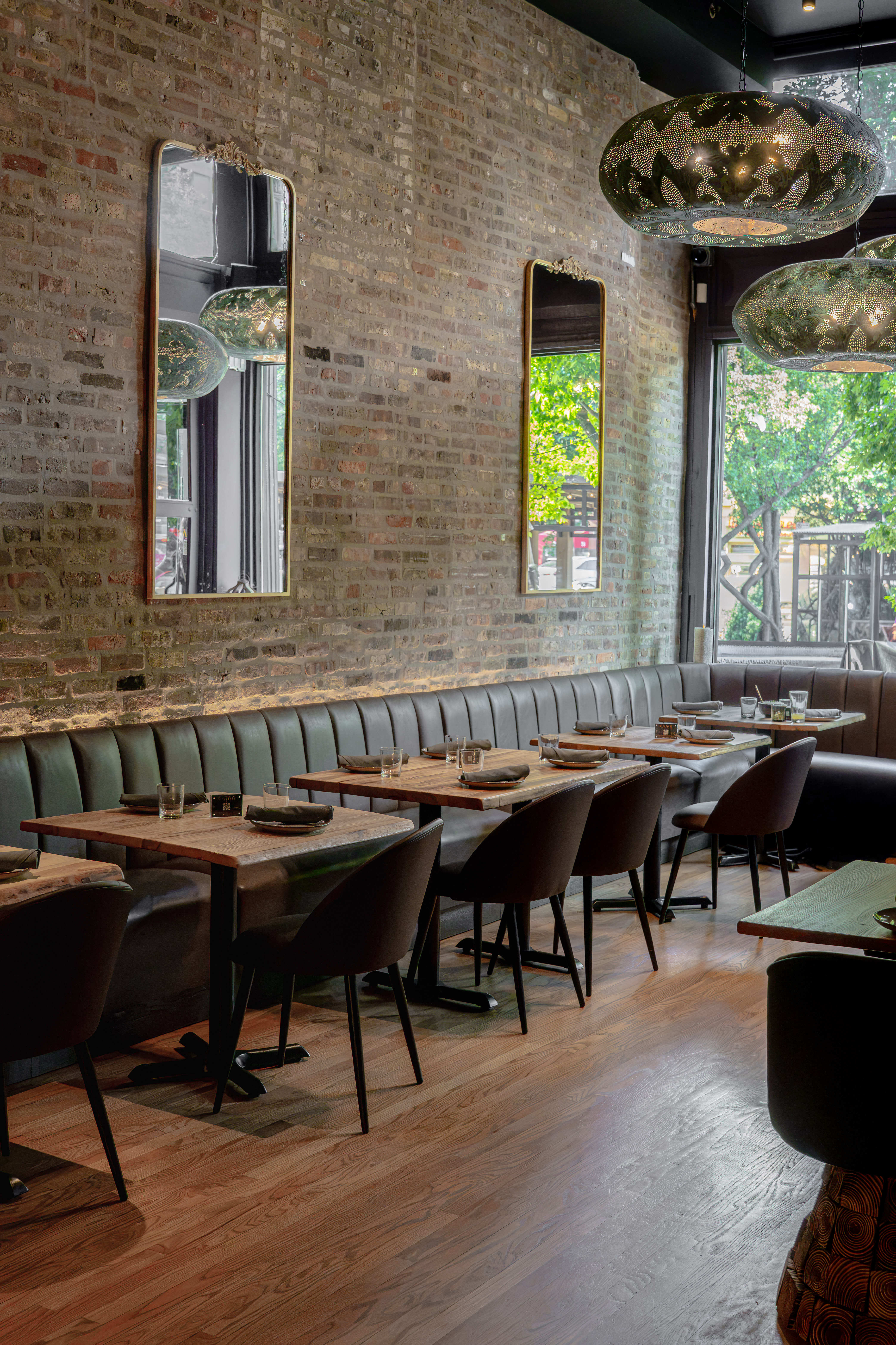 a restaurant with a booth and tables