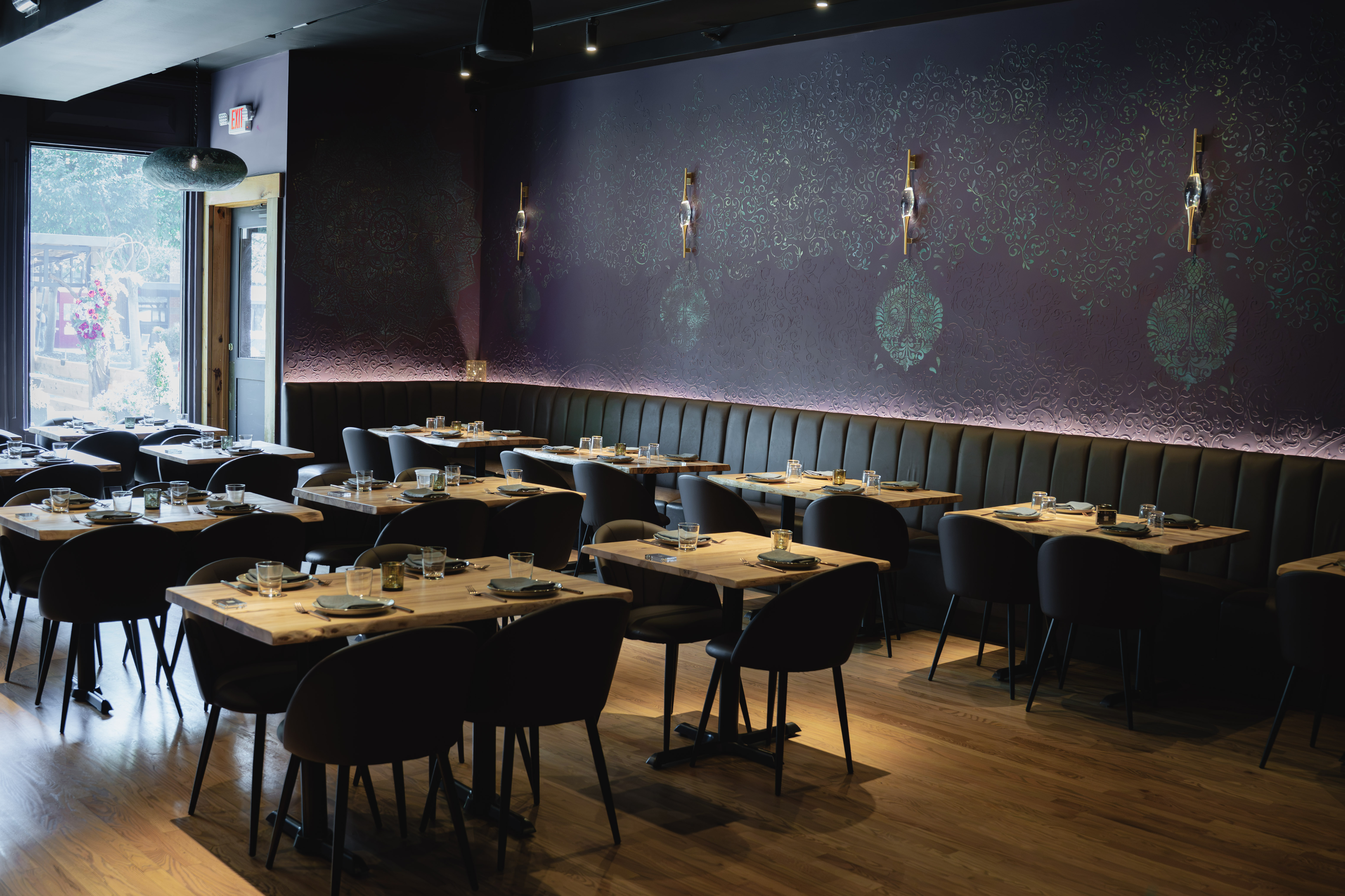 a restaurant with tables and chairs