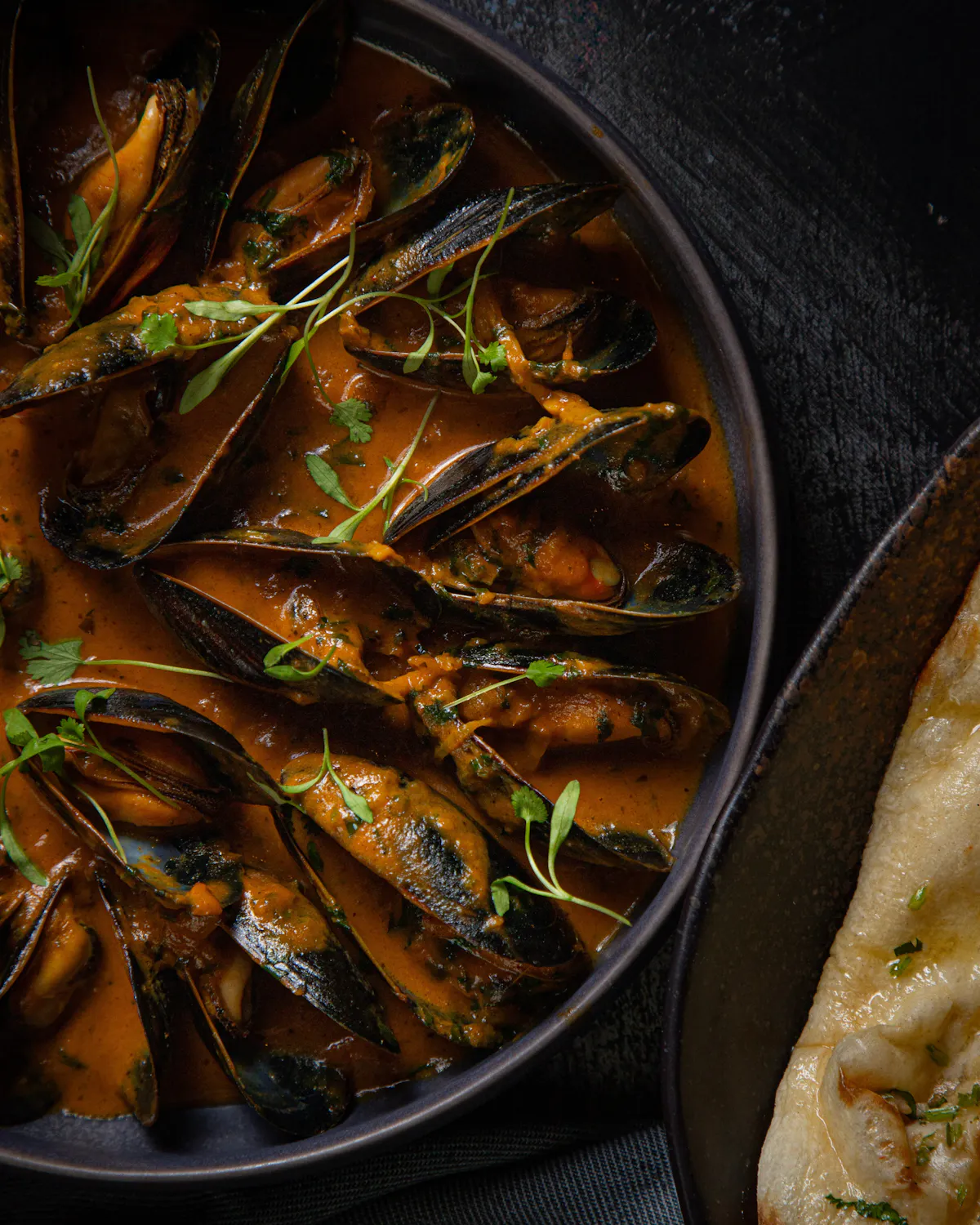 Goan Mussels Curry with coconut and tamarind at KAMA La Grange