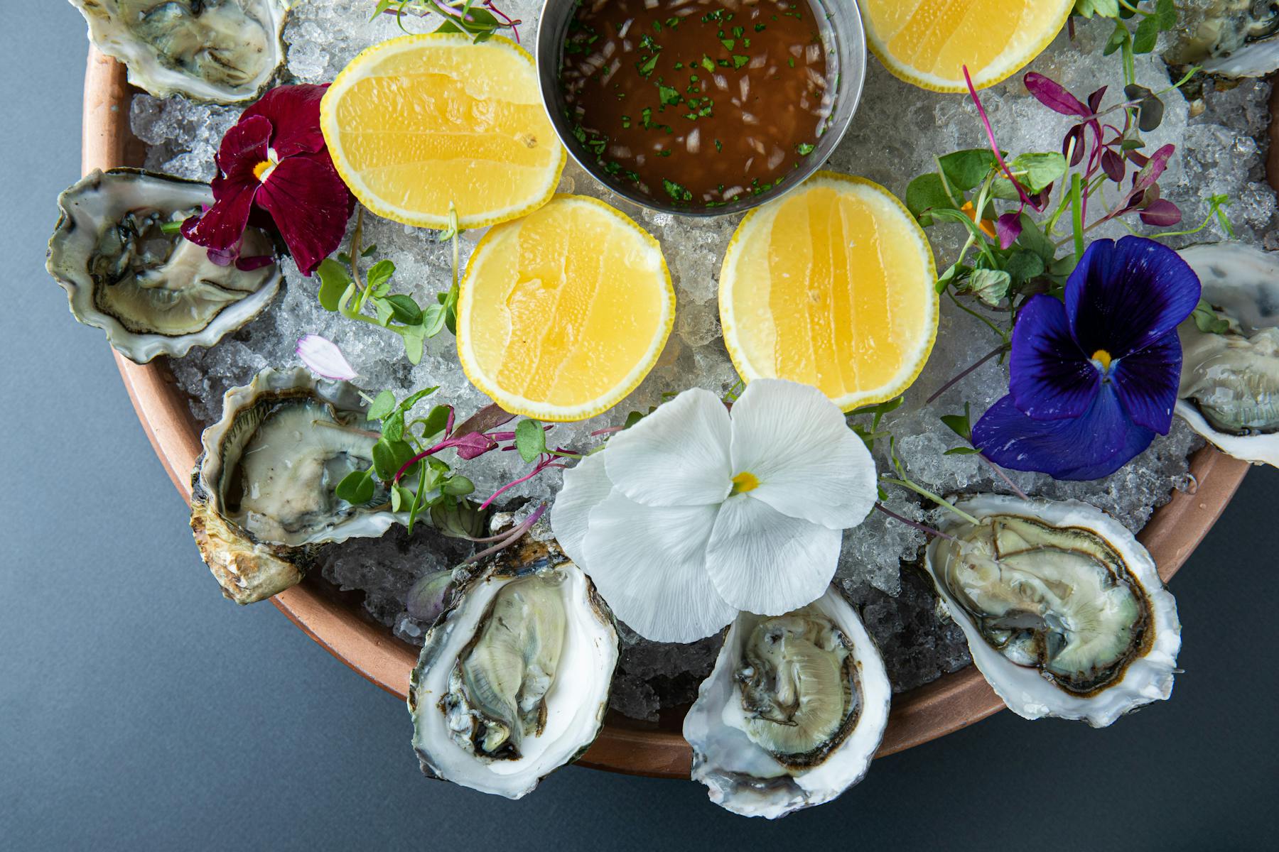 a plate filled with seafood and vegetables