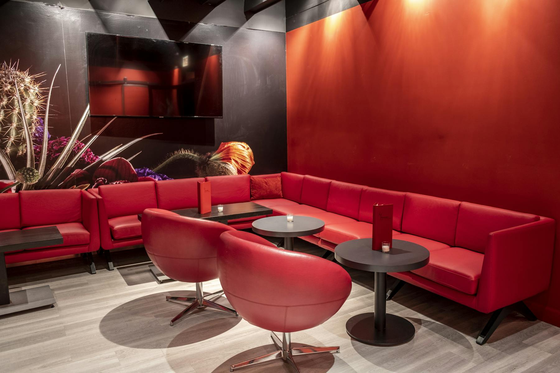 a large red chair in a room