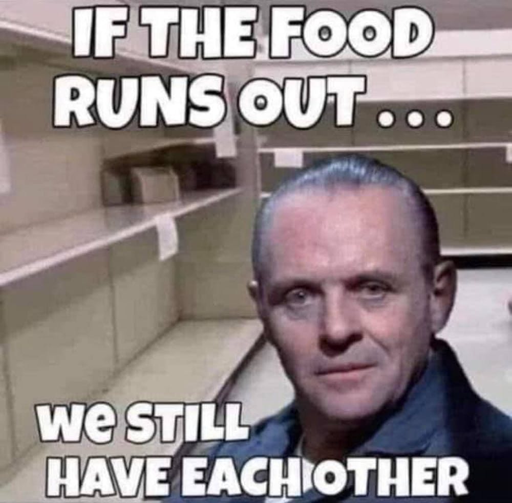 Anthony Hopkins holding a sign