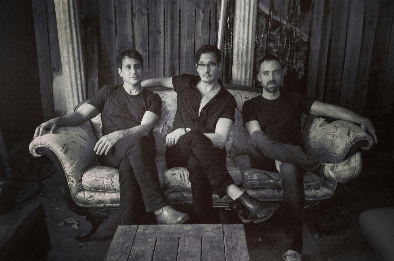 a group of people sitting on a bench