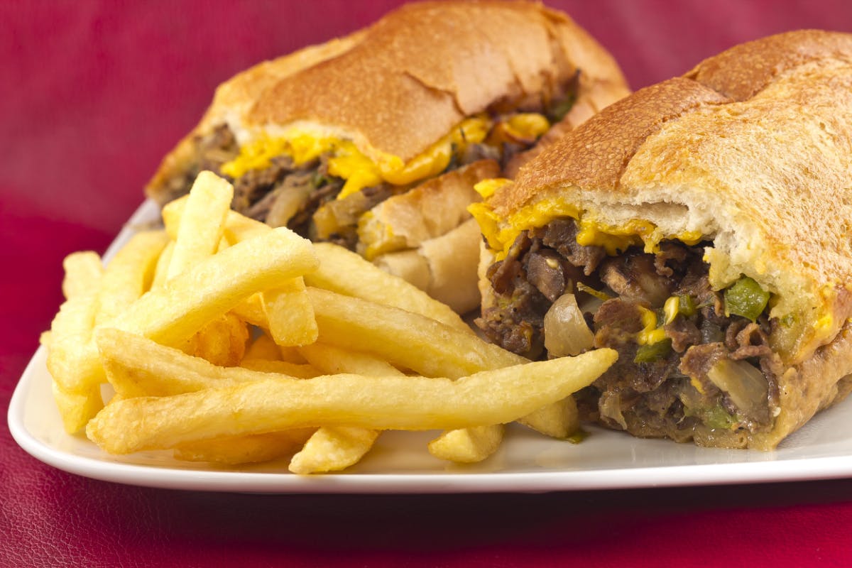a philly cheesesteak and fries