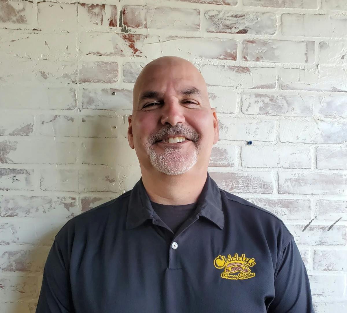 a man smiling for the camera