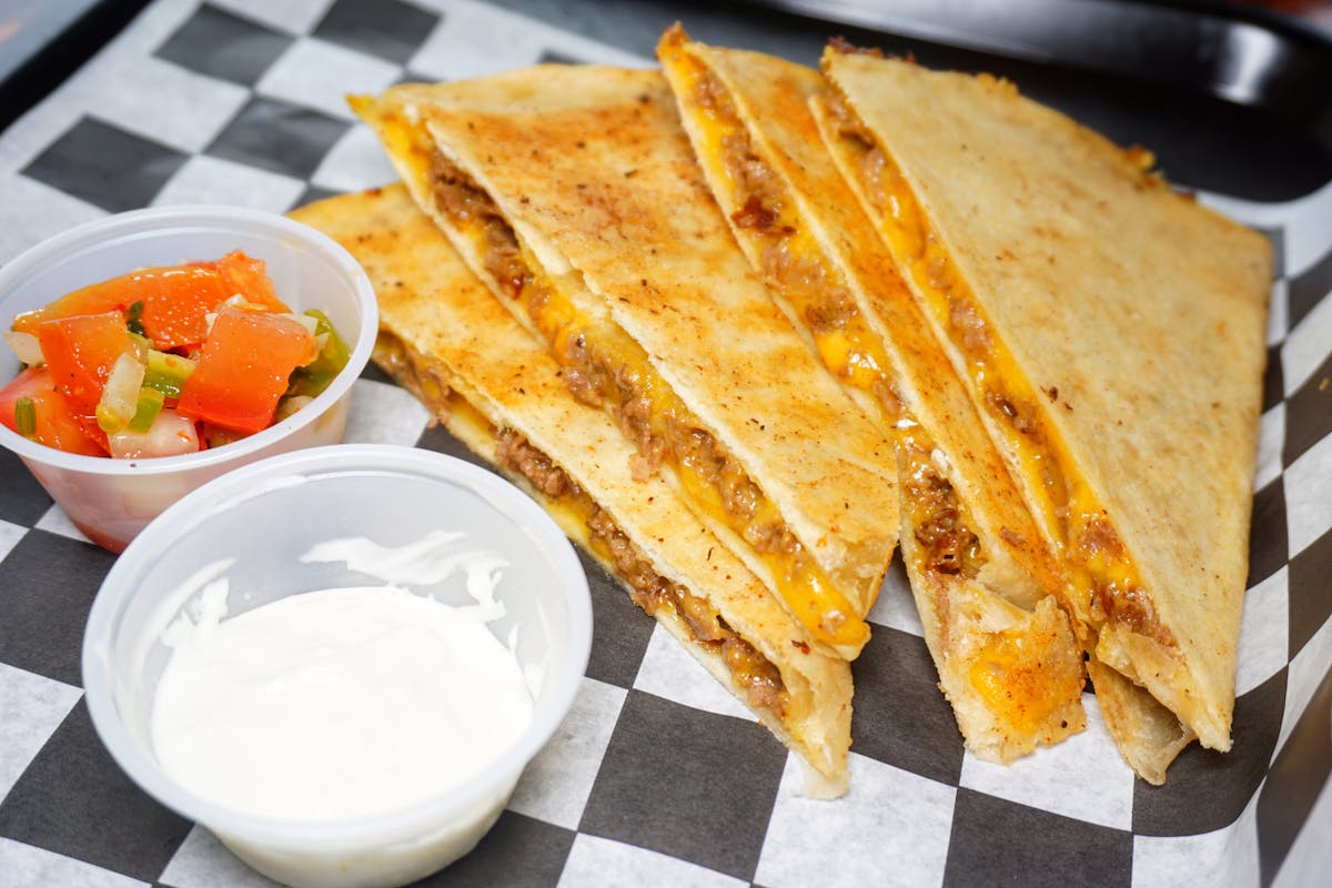 a plate of food with a slice cut out