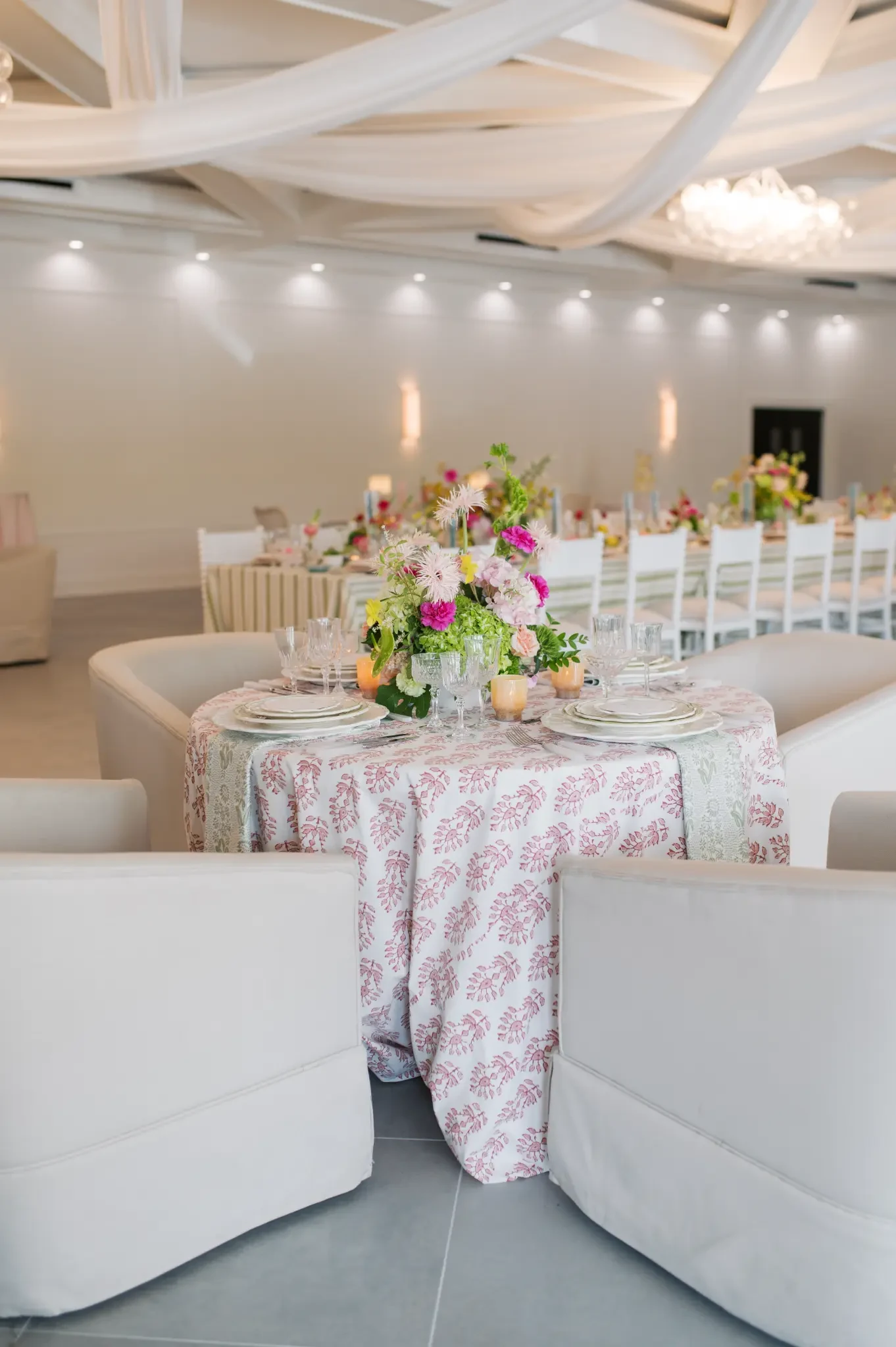 Reception Hall arranged with floral-covered tables