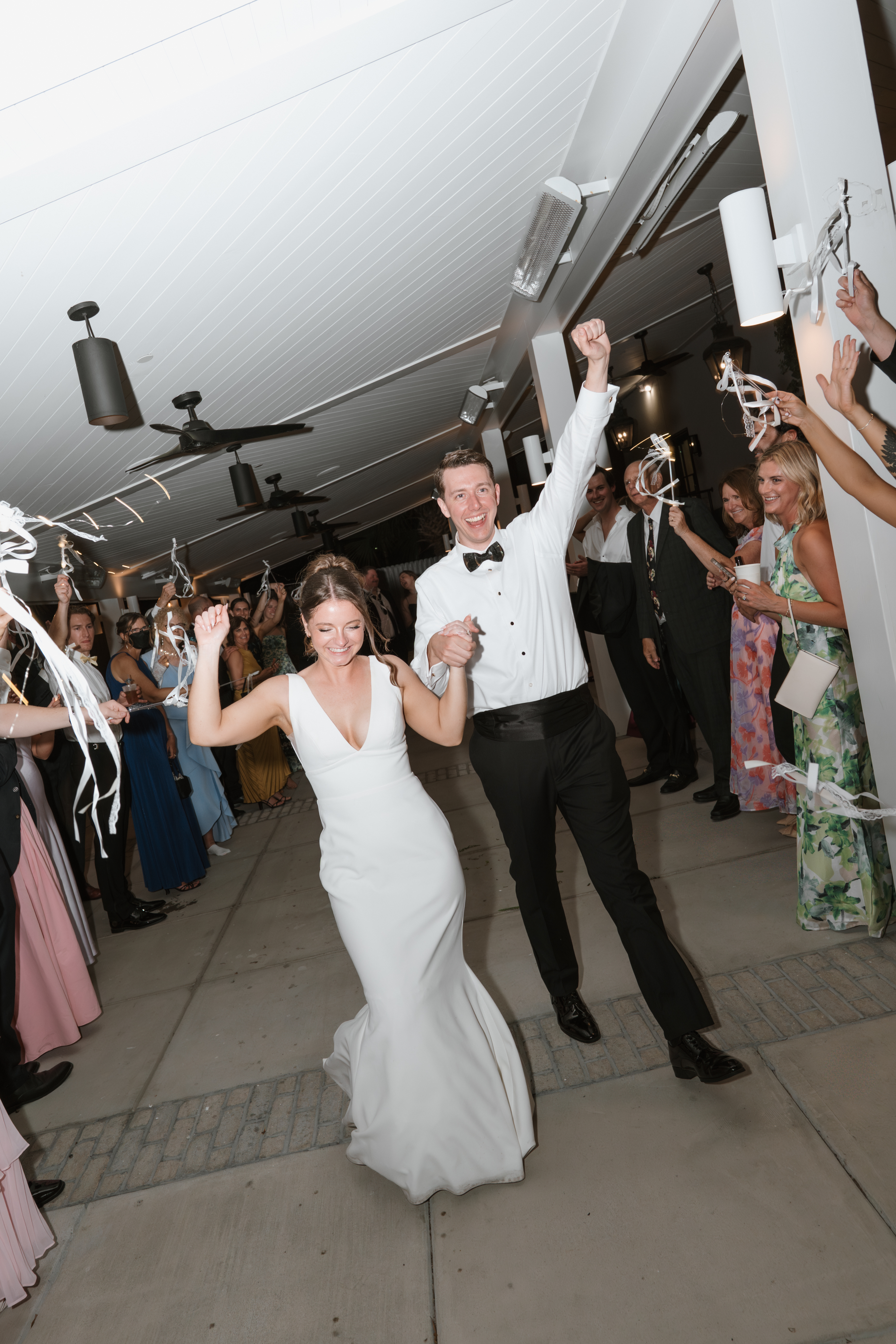 bride and groom leaving wedding