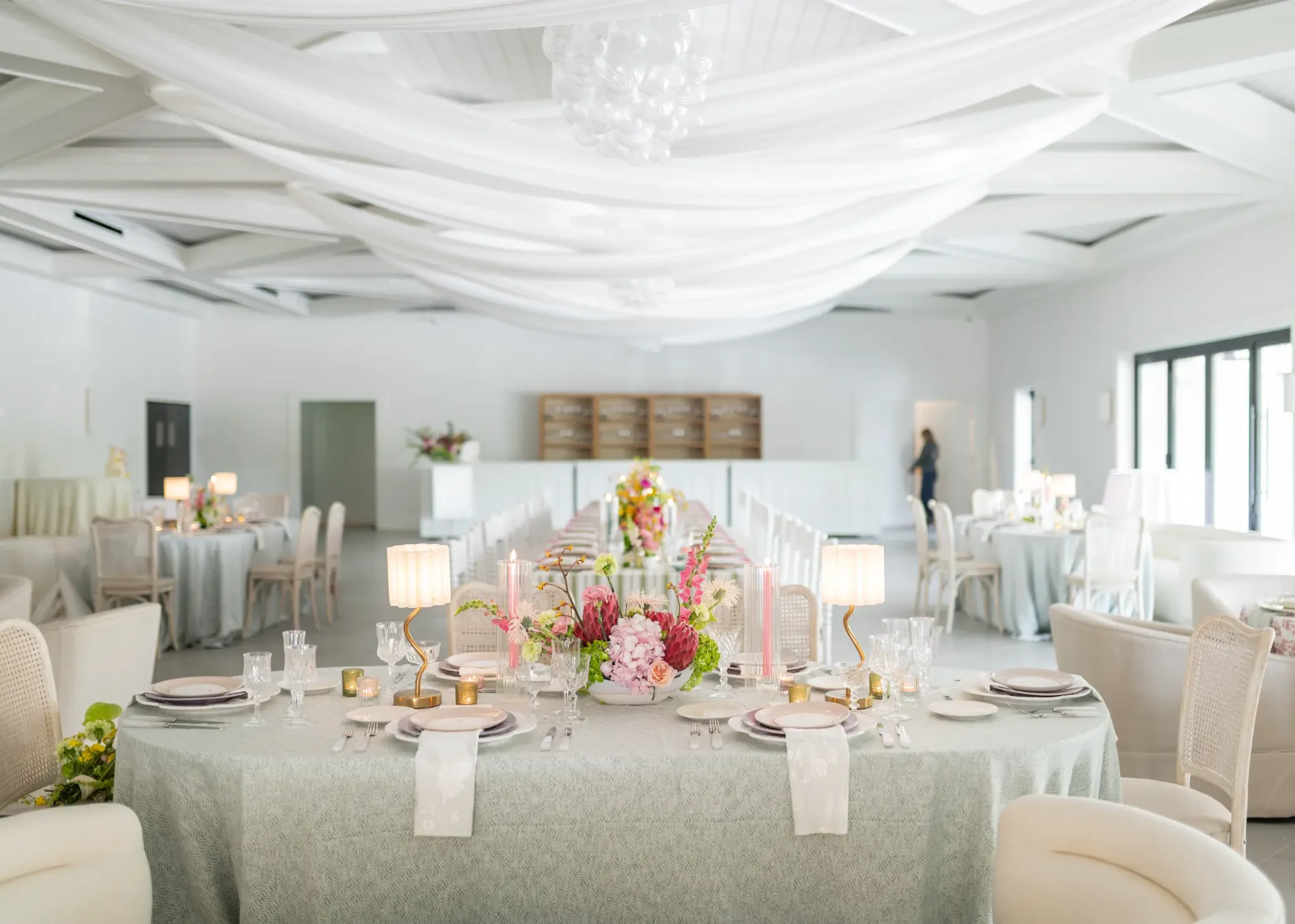 Soft floral table settings in The Waverly Reception Hall