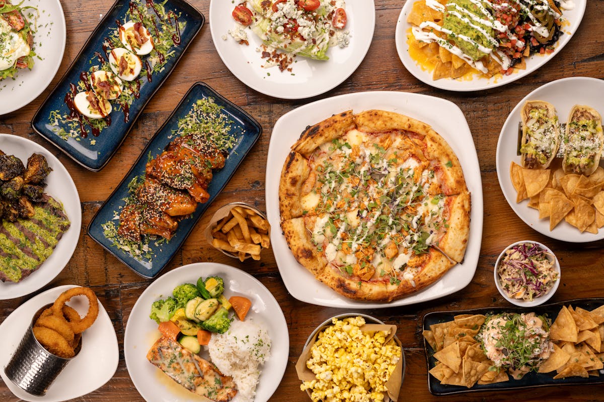 a bunch of different types of food on a table
