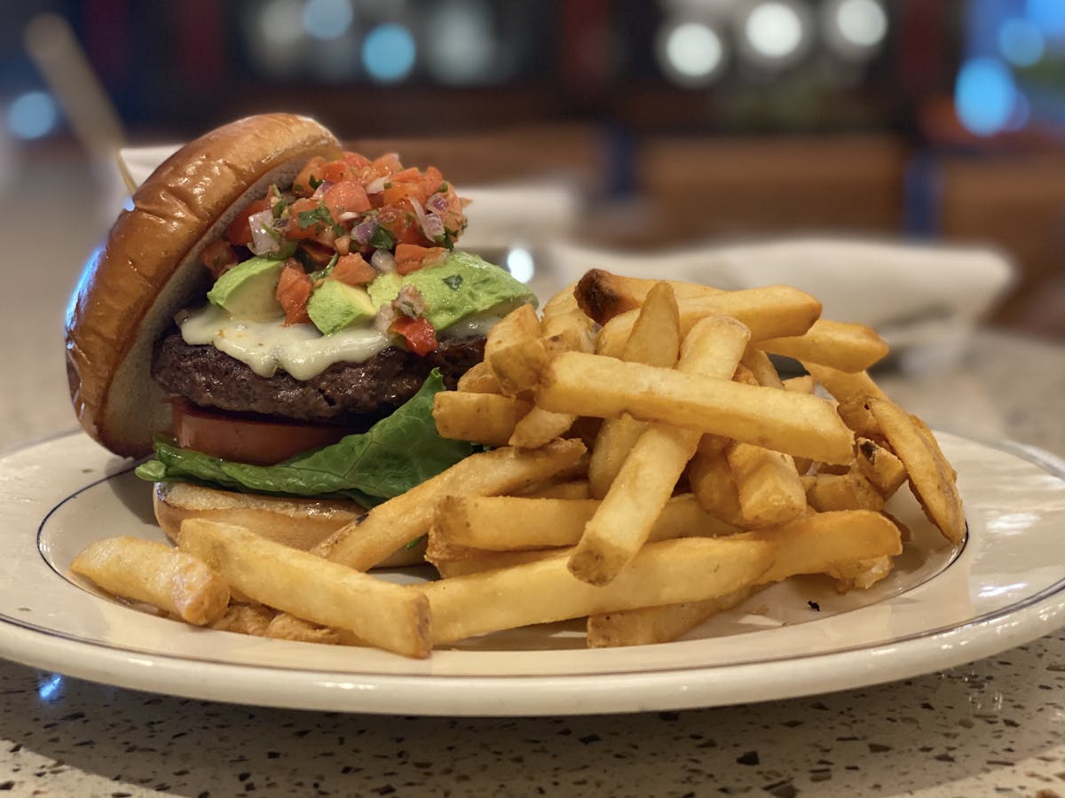 a sandwich and fries on a plate
