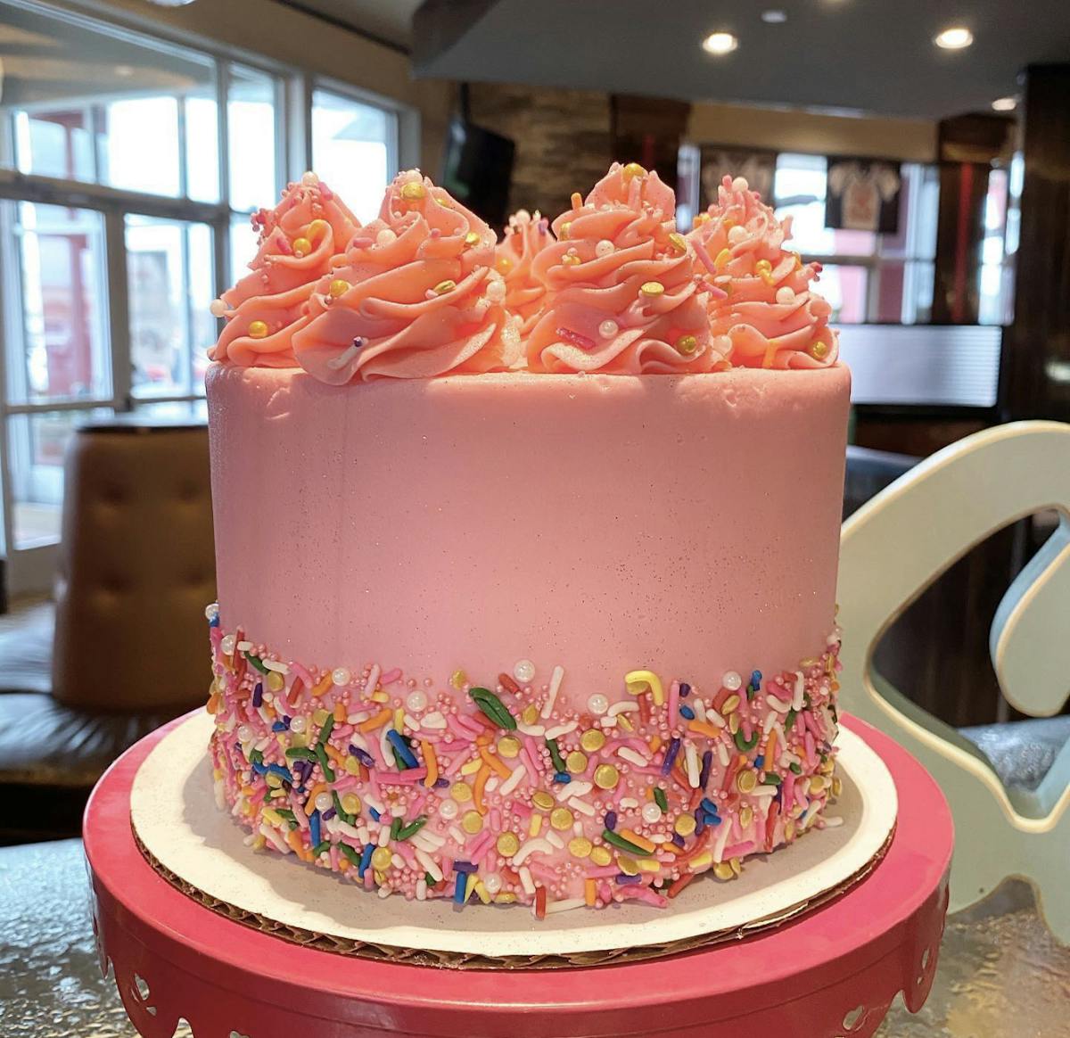 a large cake sitting on top of a table
