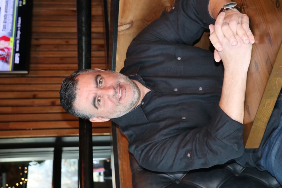 a man sitting on a table