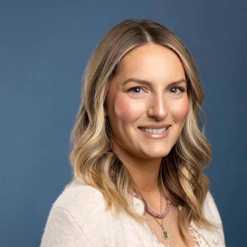 a woman smiling at camera