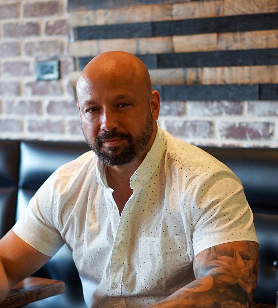 a man sitting on a table