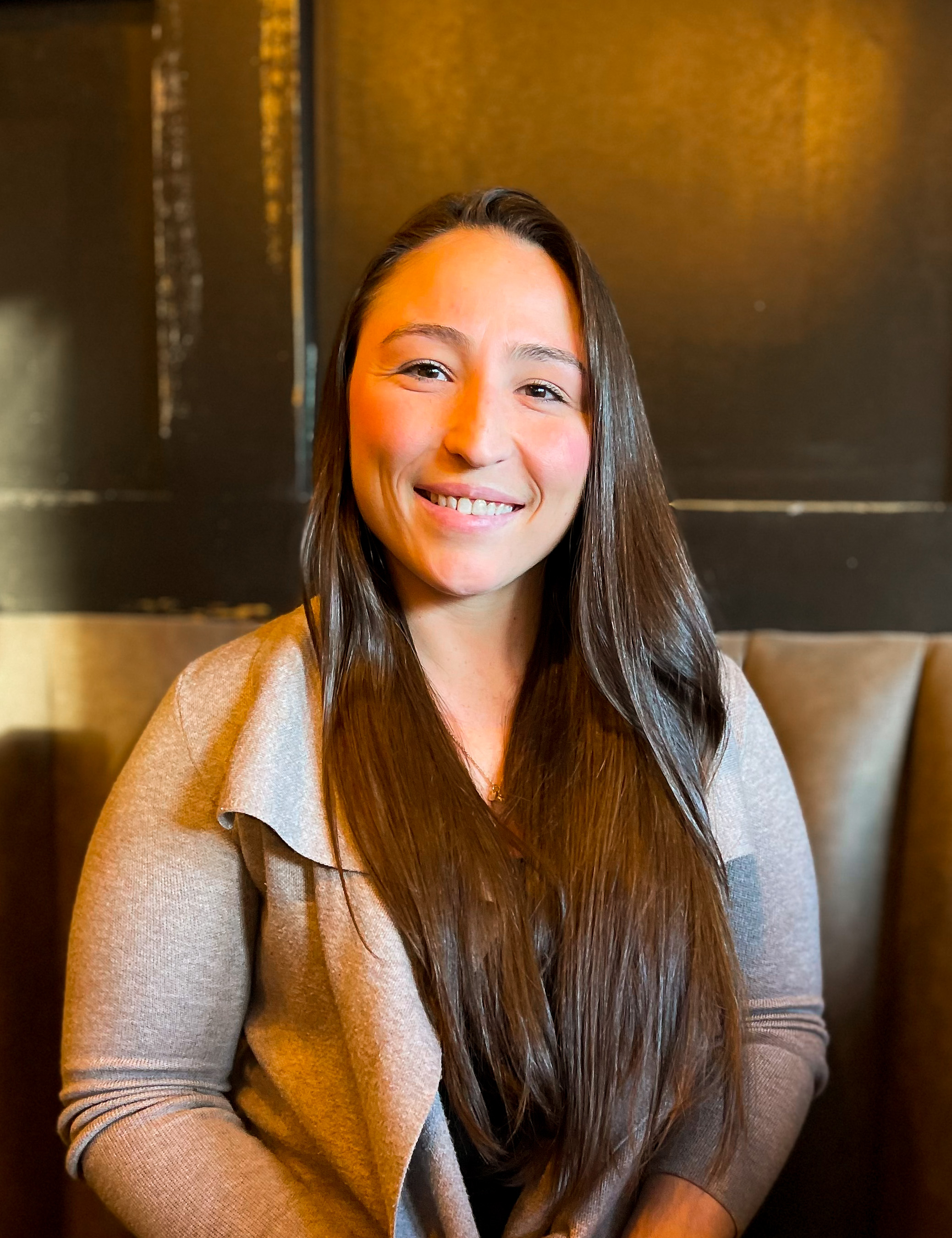a woman smiling for the camera