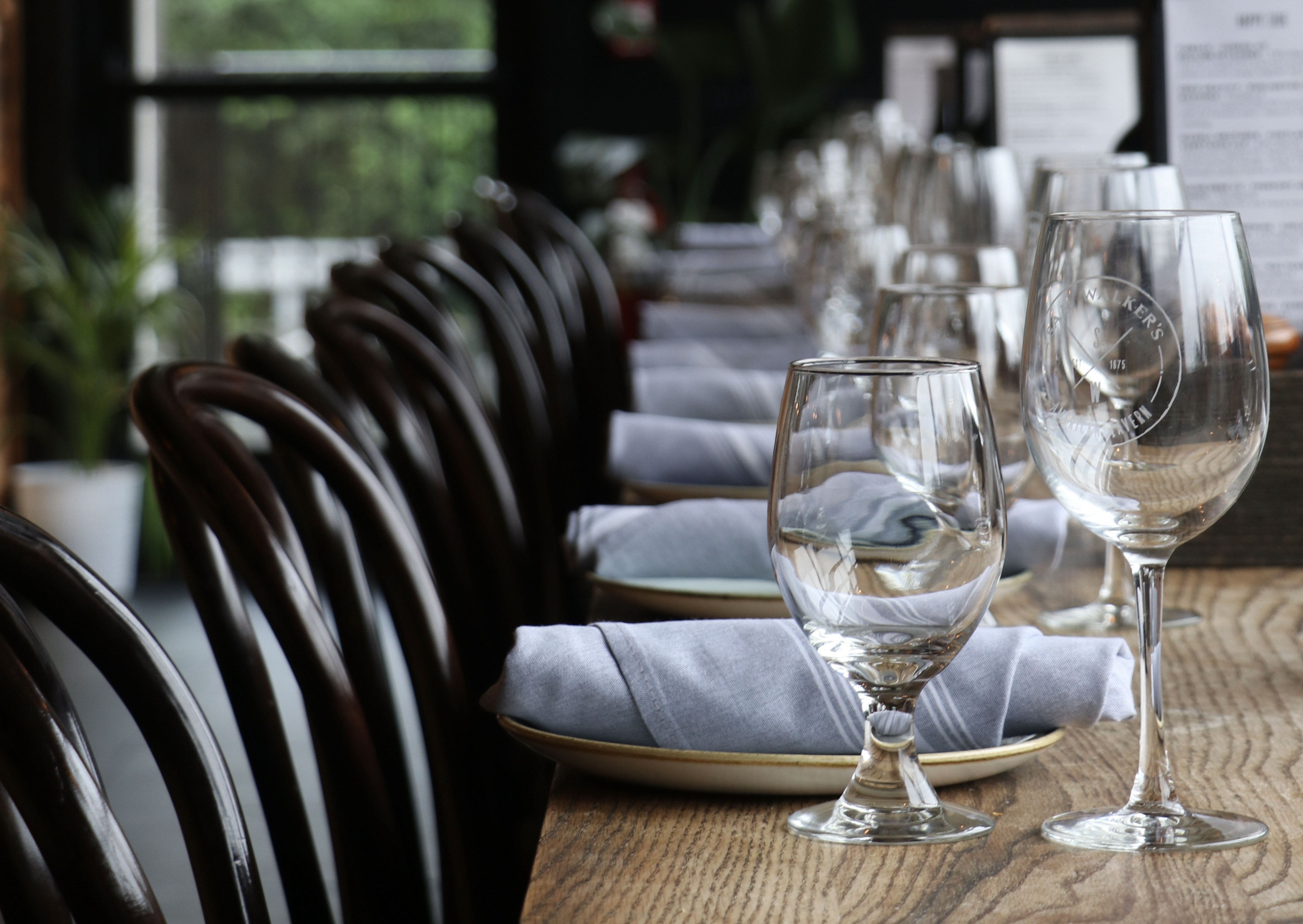 a glass of wine on a table