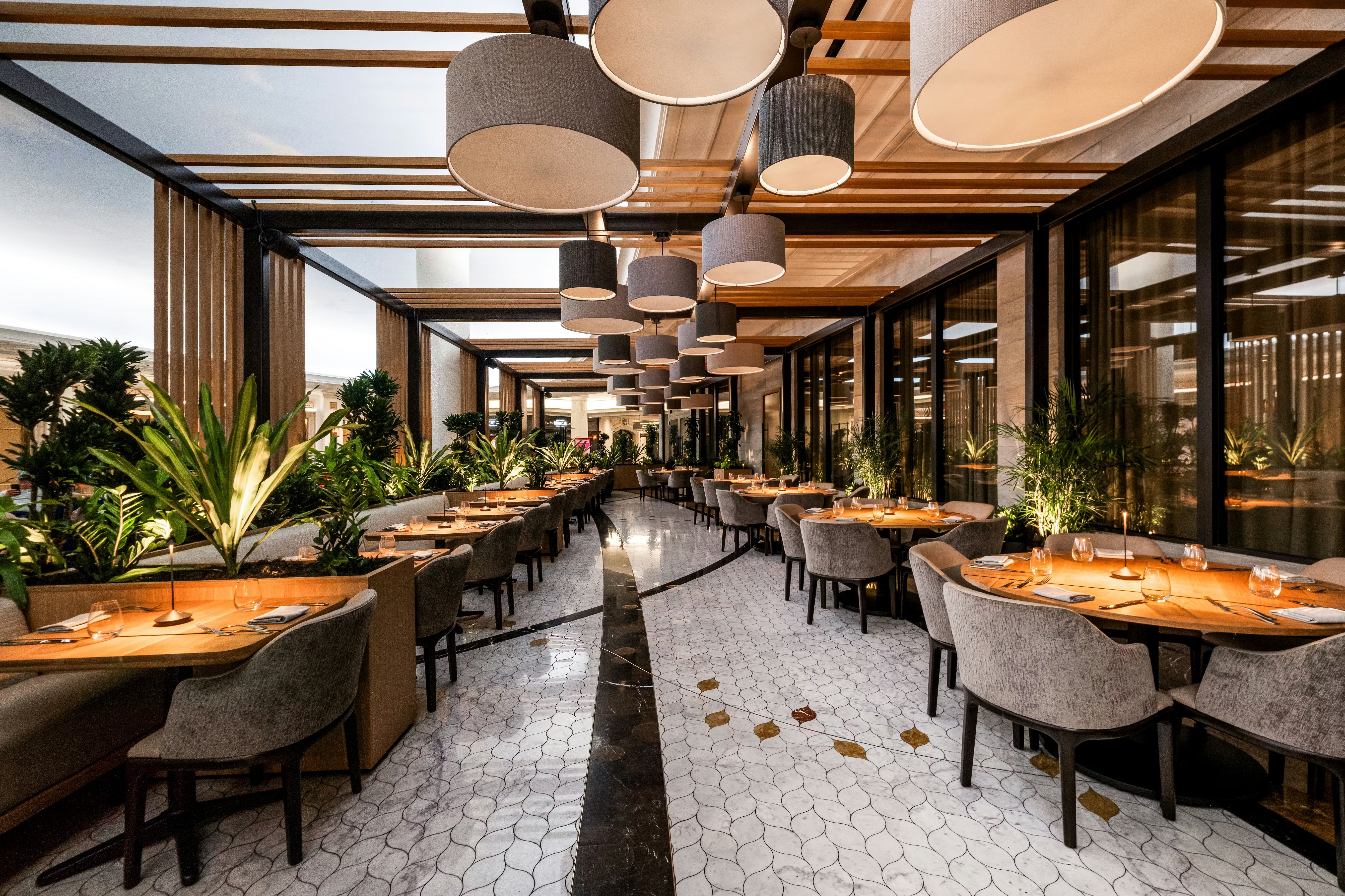 a restaurant with tables and chairs