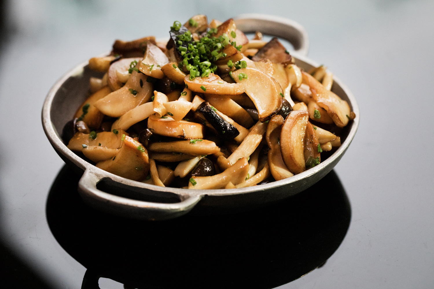 a bowl of food with broccoli