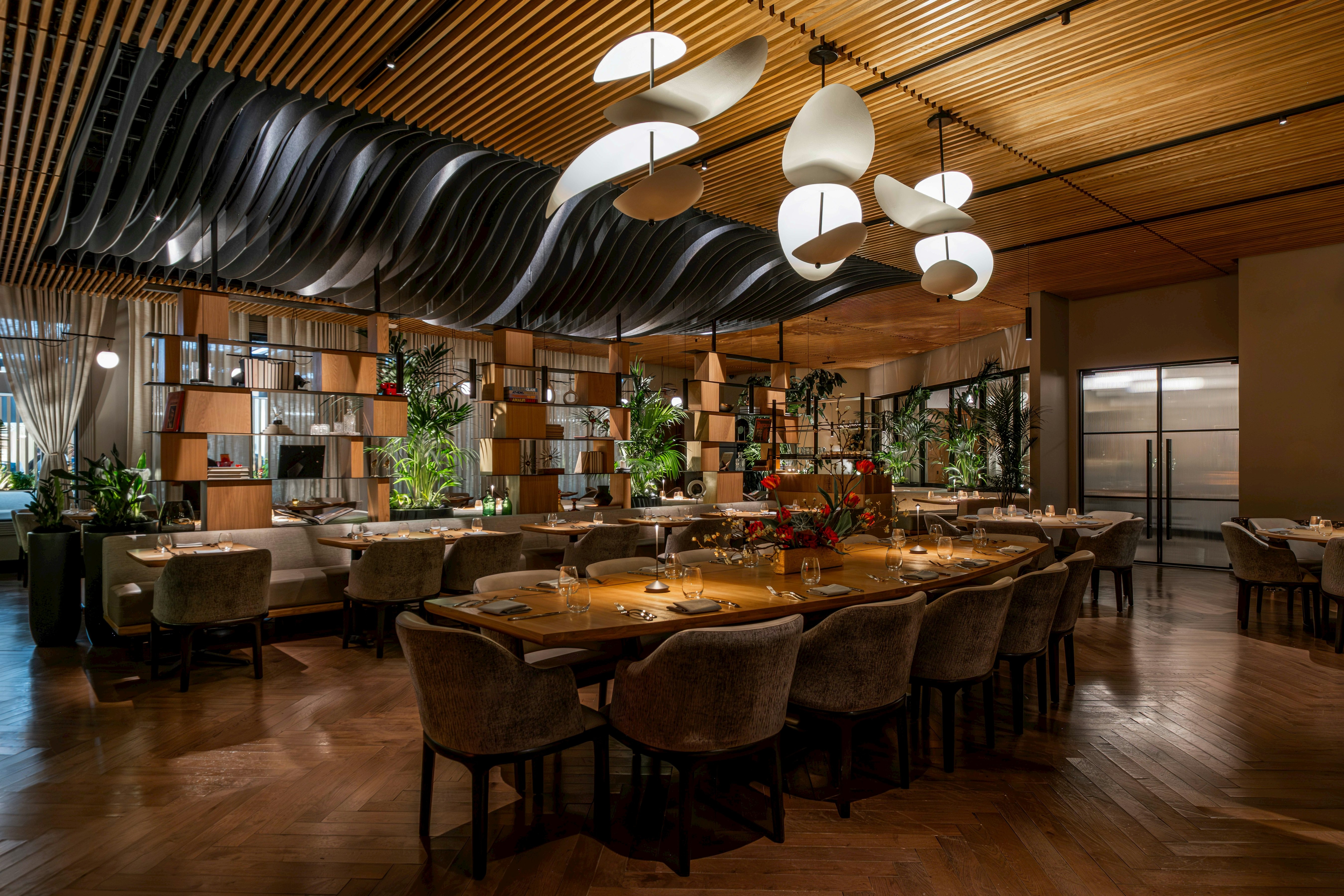 a large room with a large table and chairs