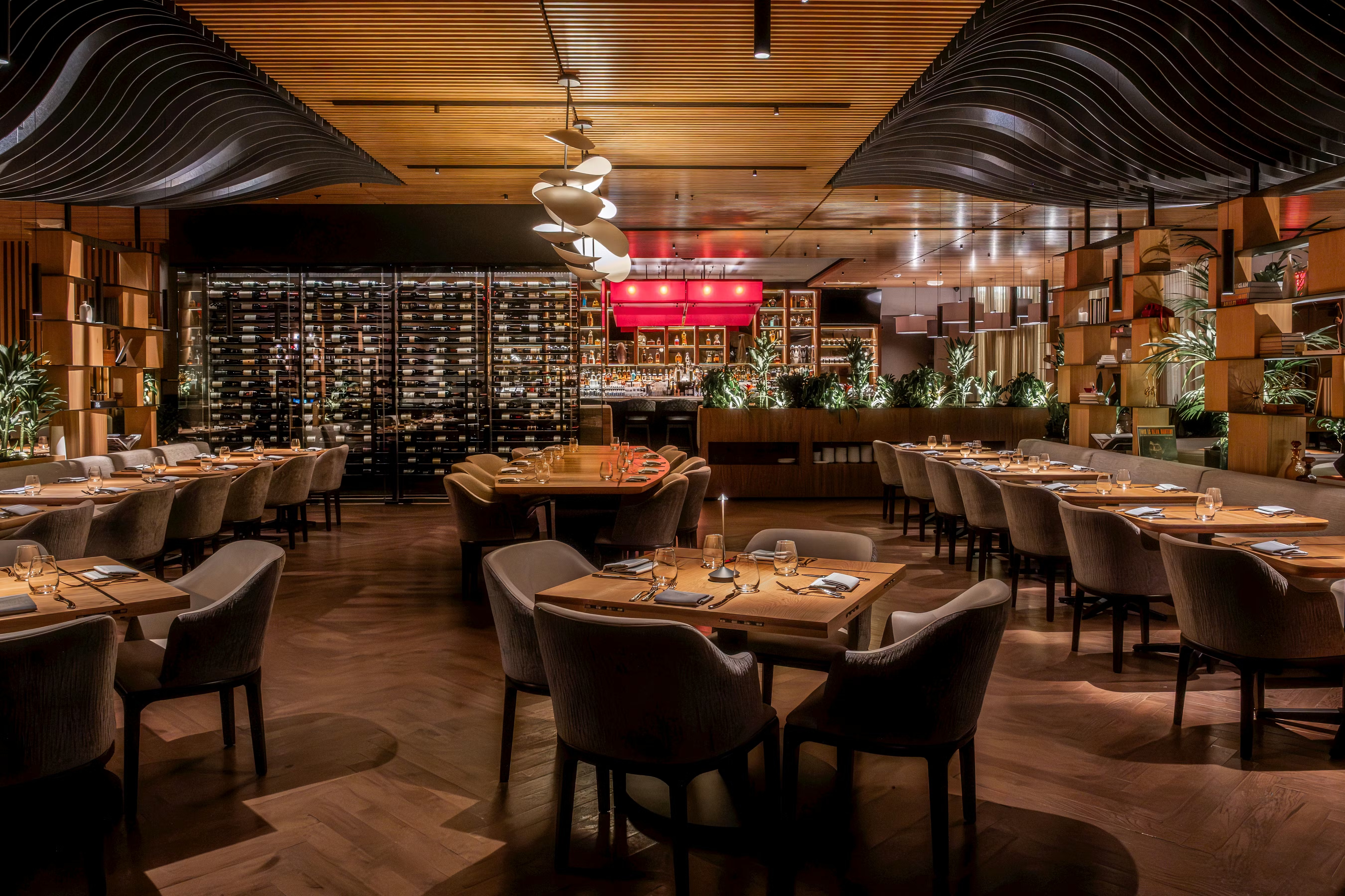 a restaurant with tables and chairs