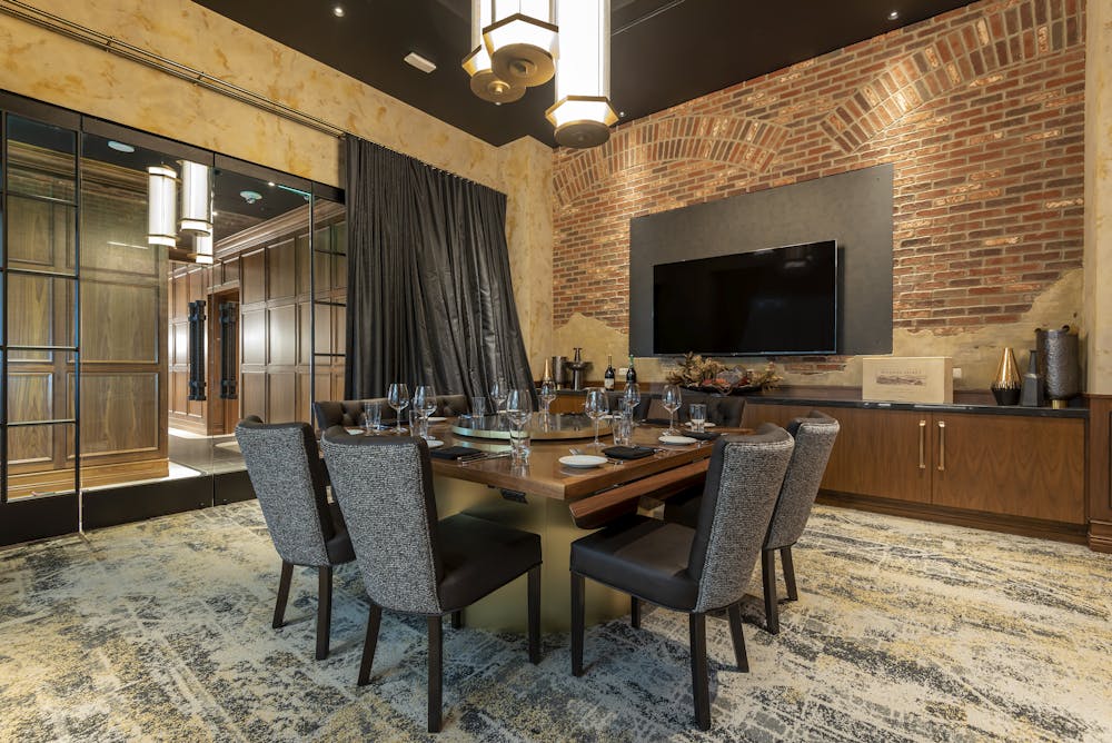 a dining room table in front of a building