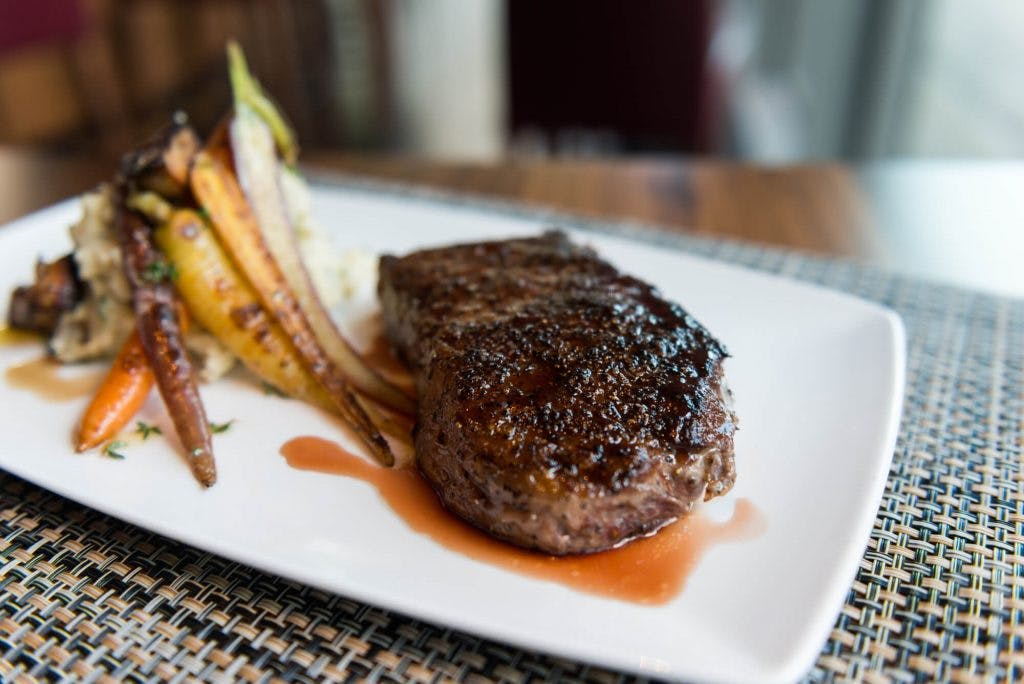 a piece of steak on a plate