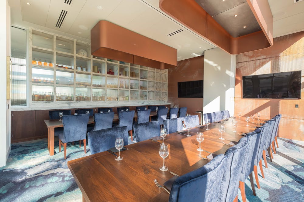 a room filled with furniture and a table
