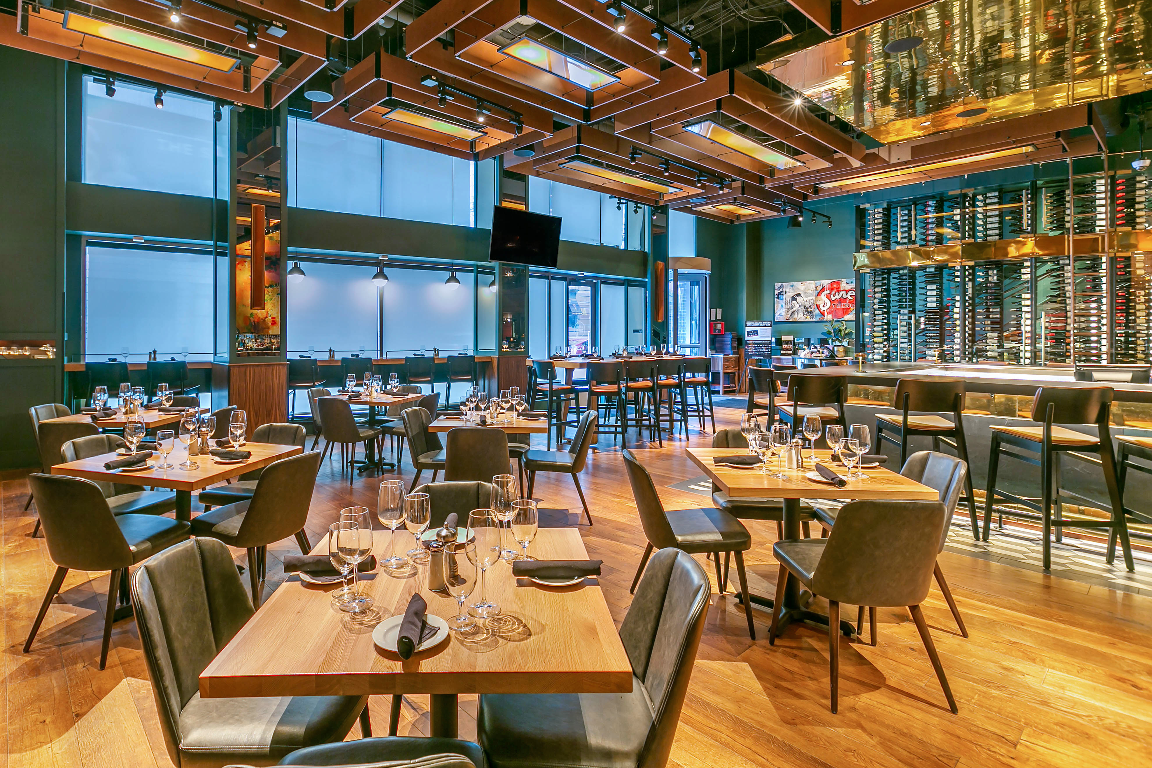 a room filled with furniture and a large window