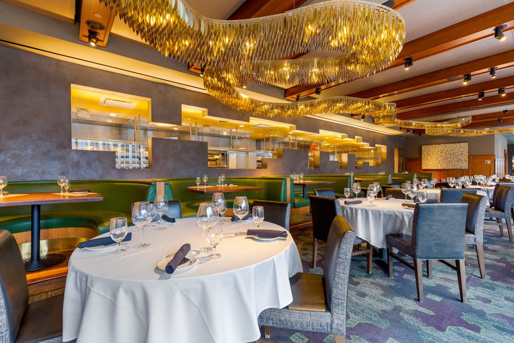 a room filled with furniture and a large window