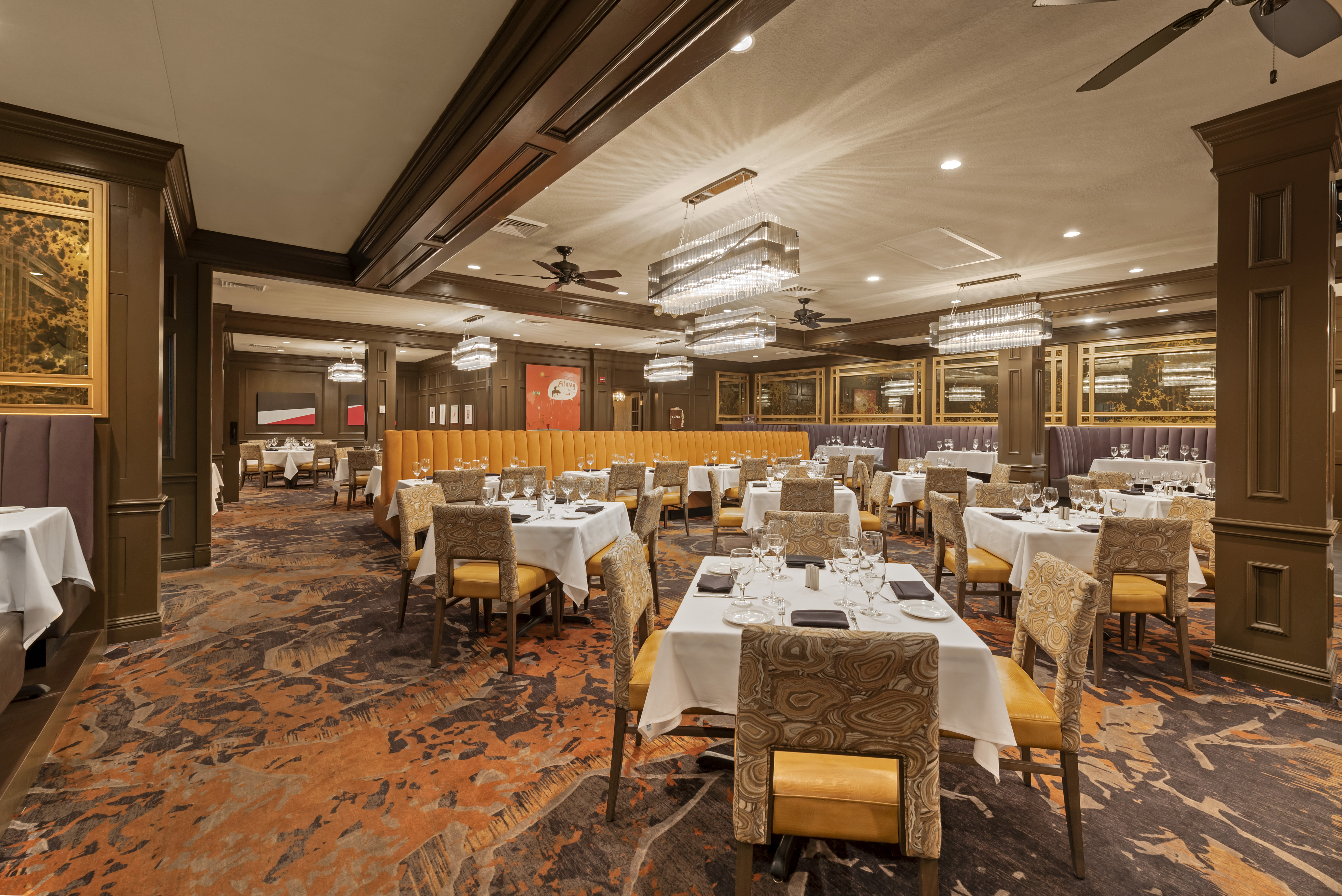 a room filled with furniture and a large window