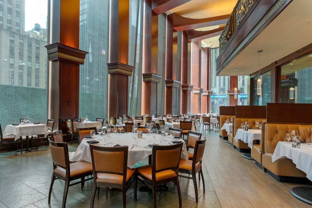 a room filled with furniture and a large window