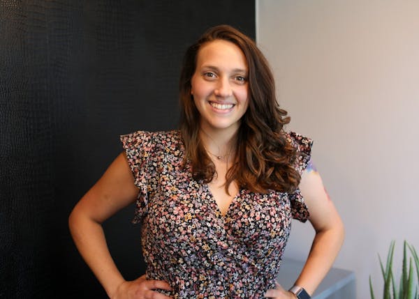 a woman smiling for the camera