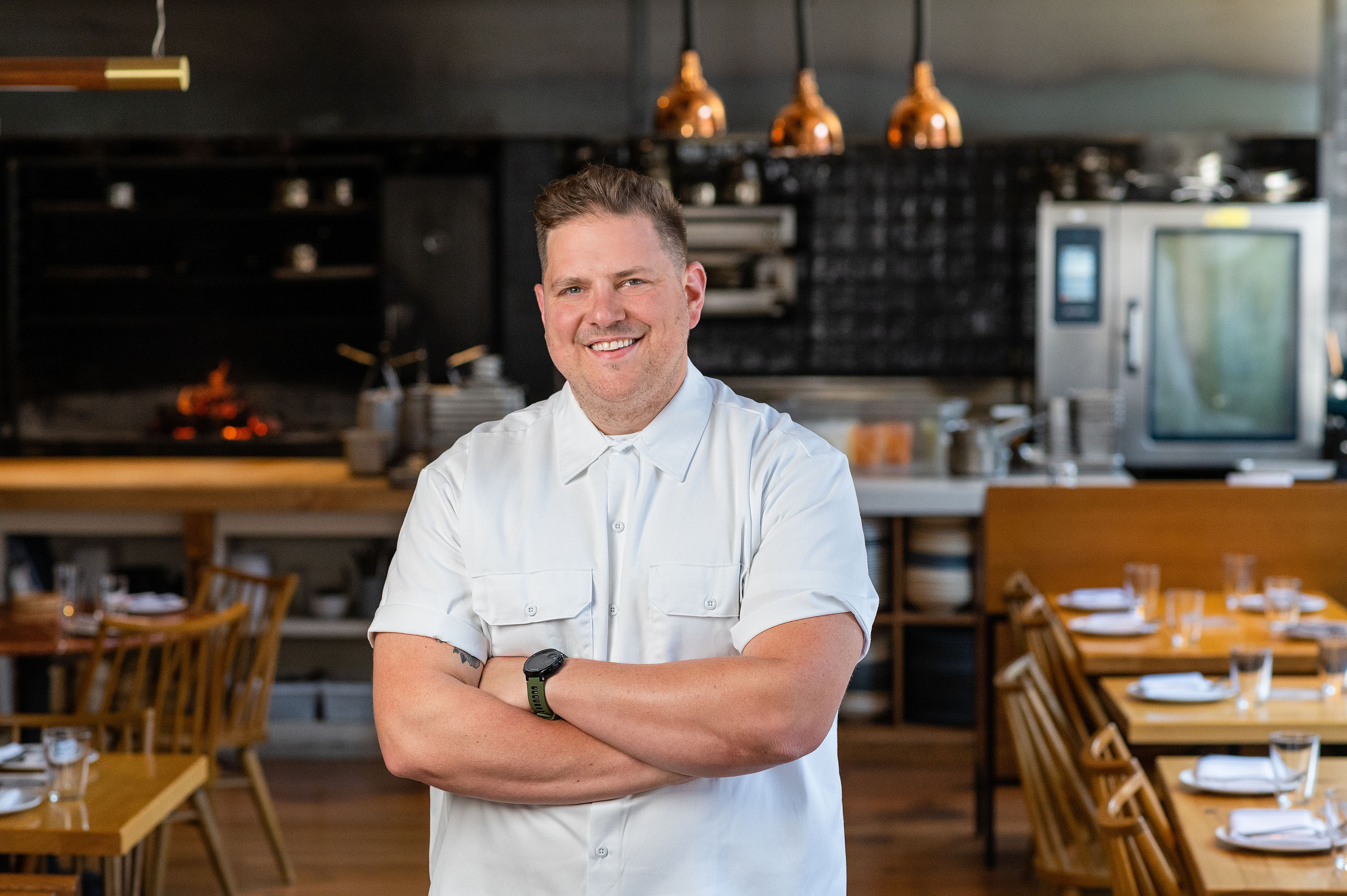 a man sitting at a table in a restaurant