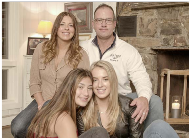 a group of people posing for the camera