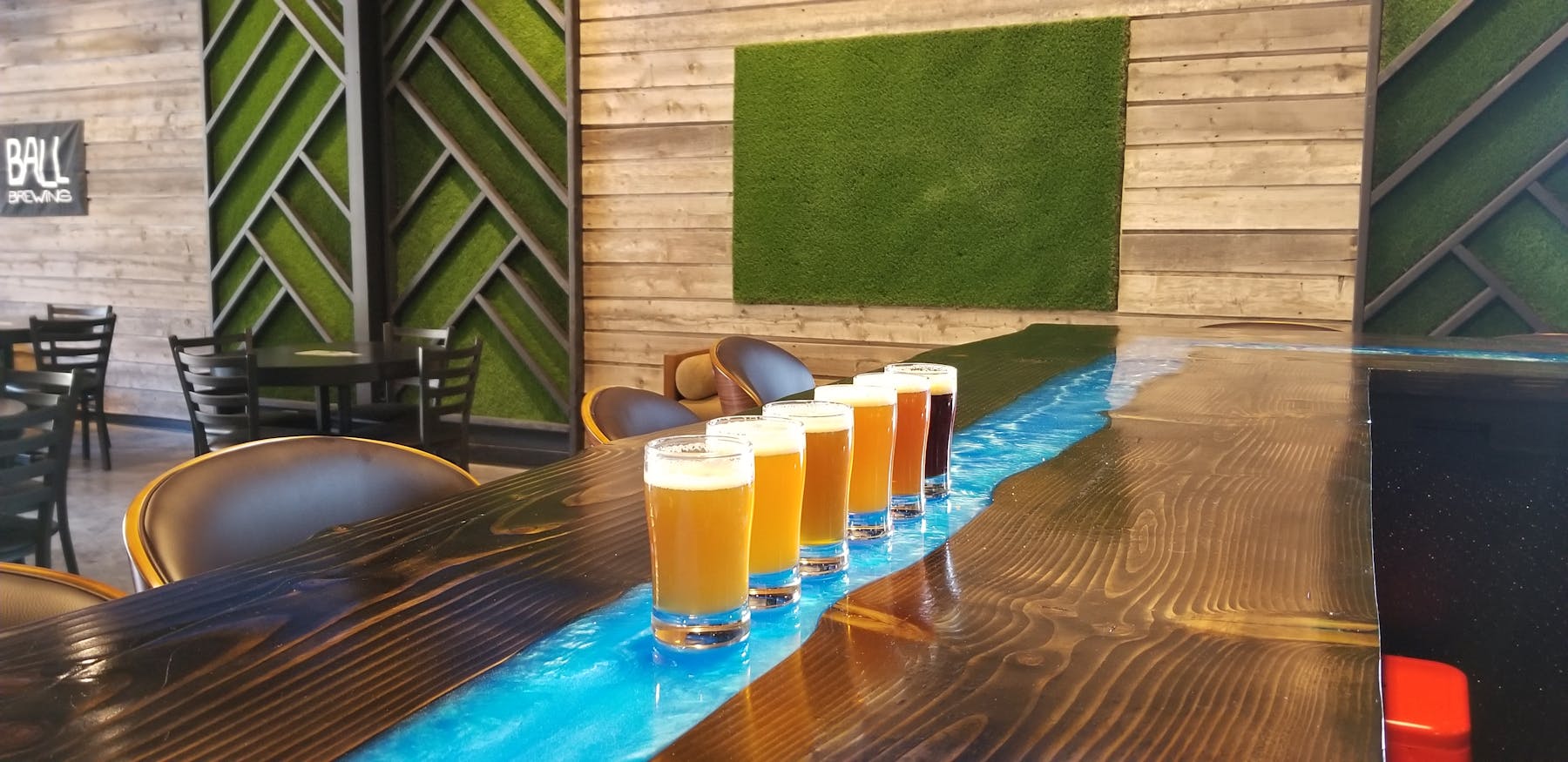 a table topped with a blue umbrella