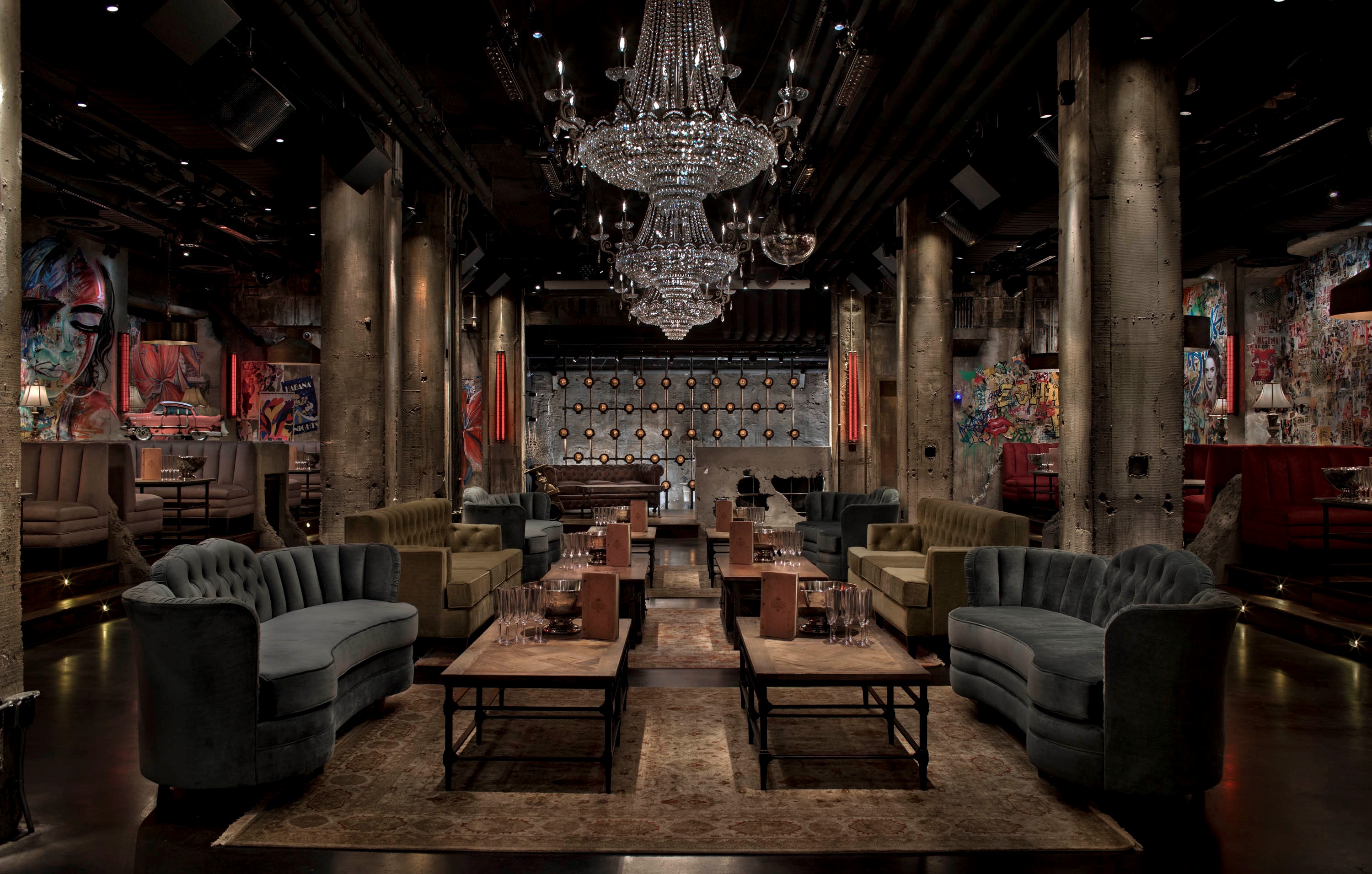 a living room filled with furniture and a fire place