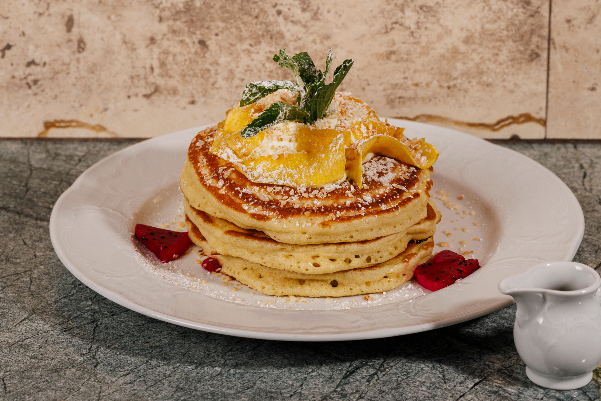 Guava Pancakes  Mojito cream cheese whip, coffee maple syrup, guava curd, coconut crumbs