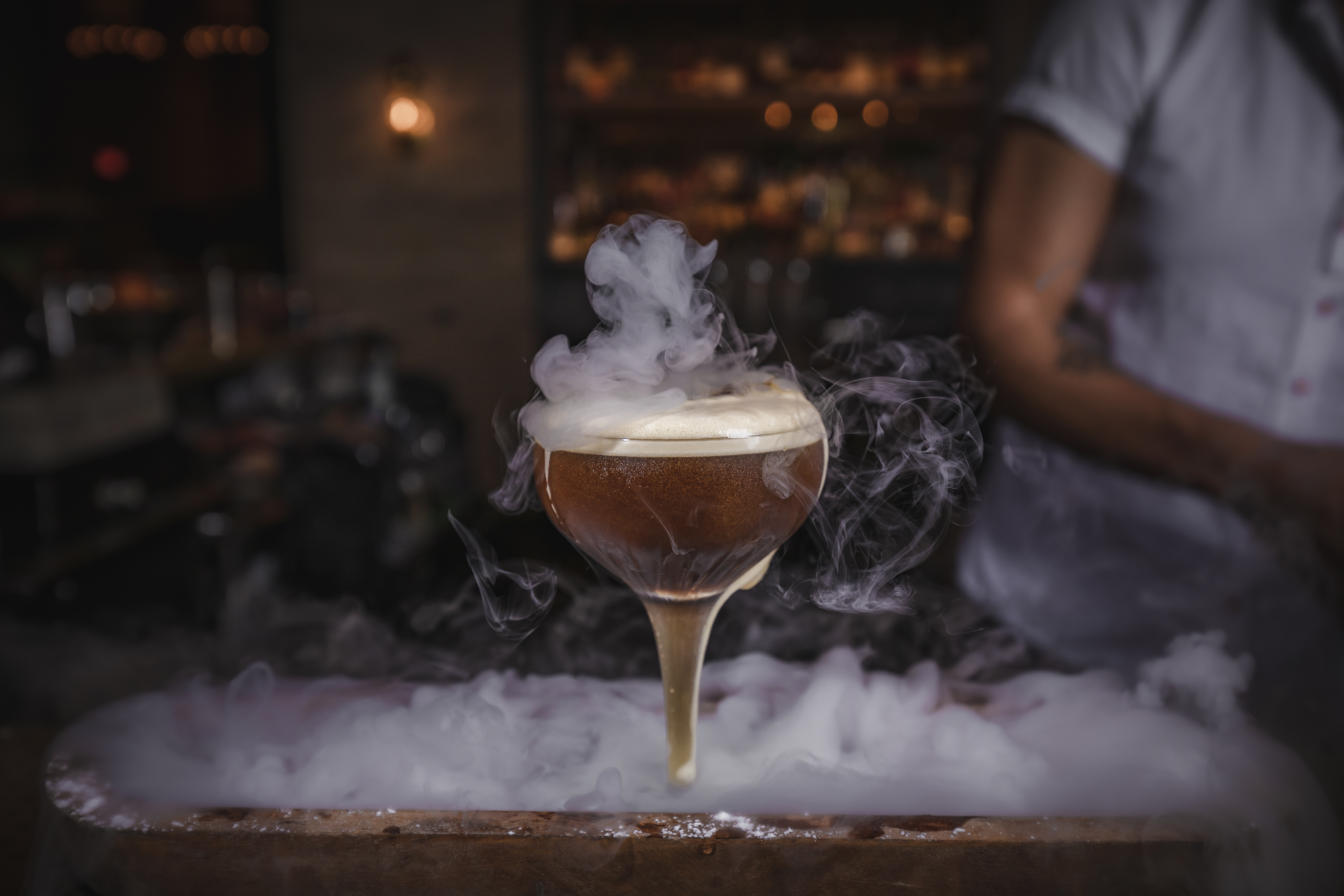 a glass of beer on a table