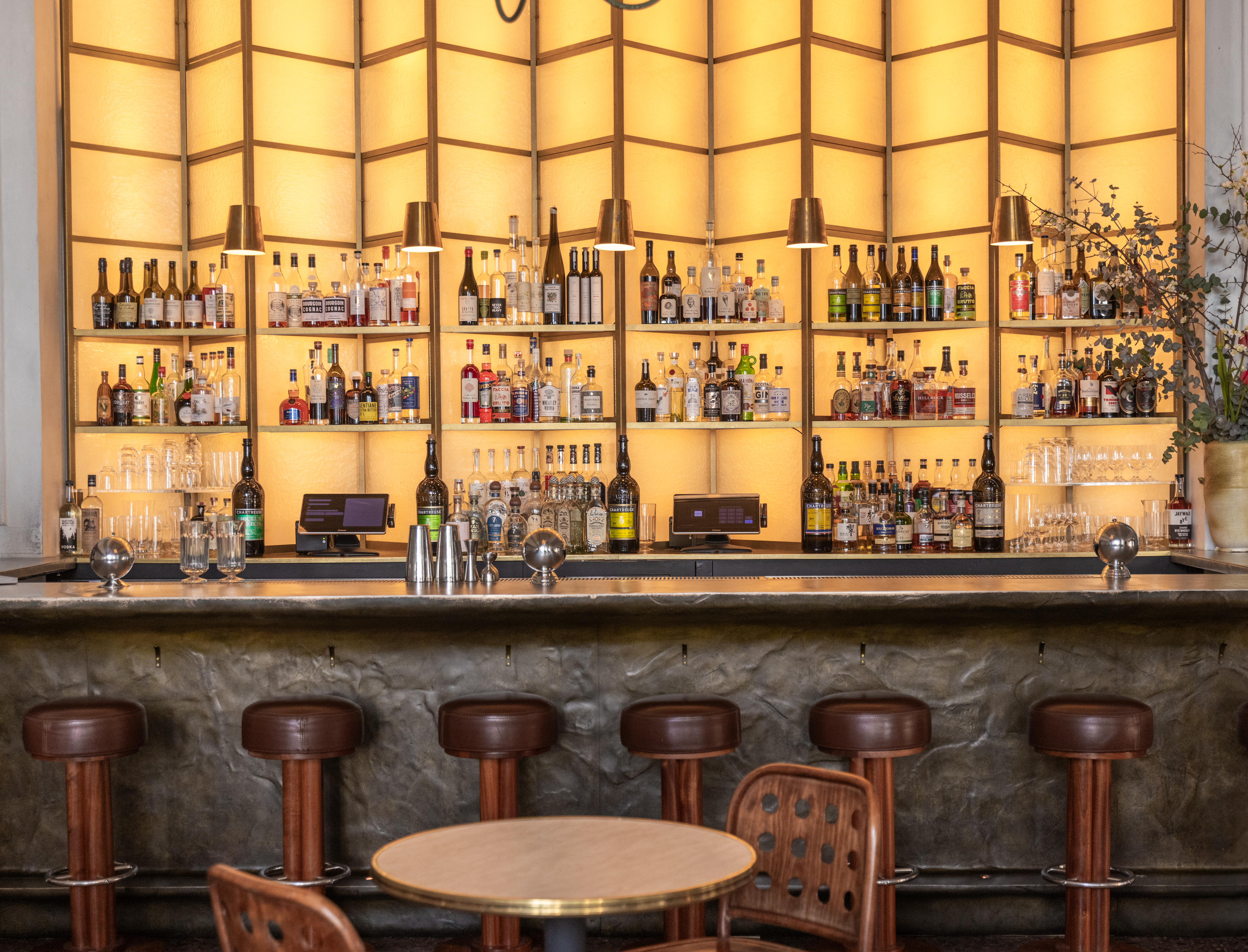 a group of glass bottles on a table