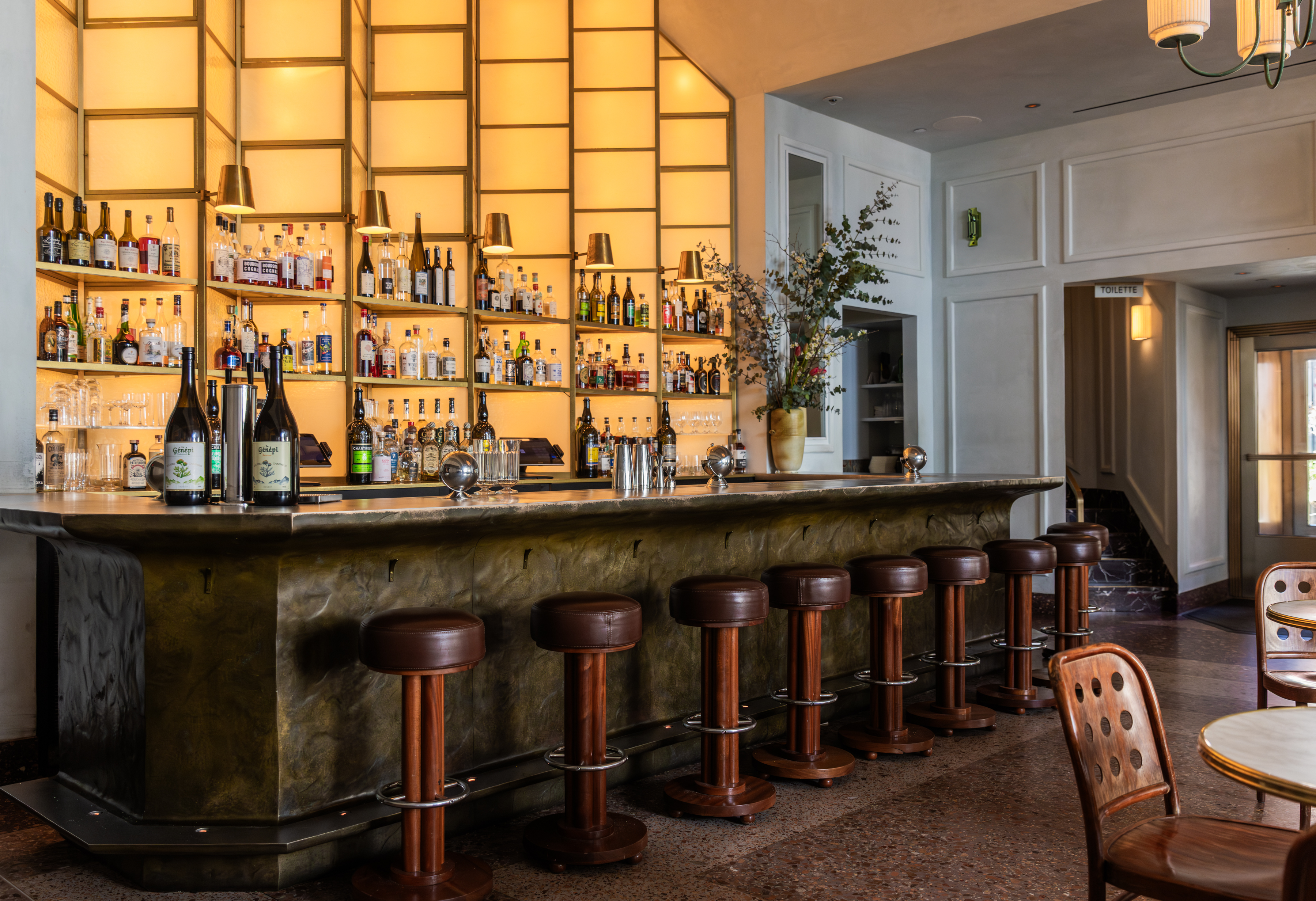 a room filled with furniture and a large window