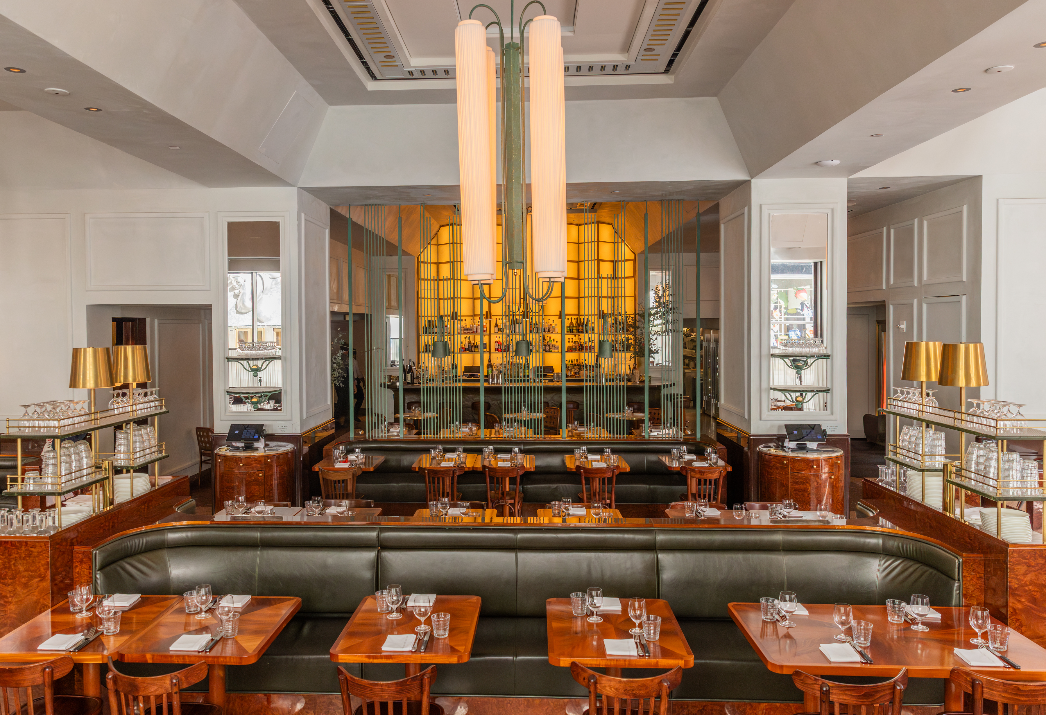 a dining room table in front of a window